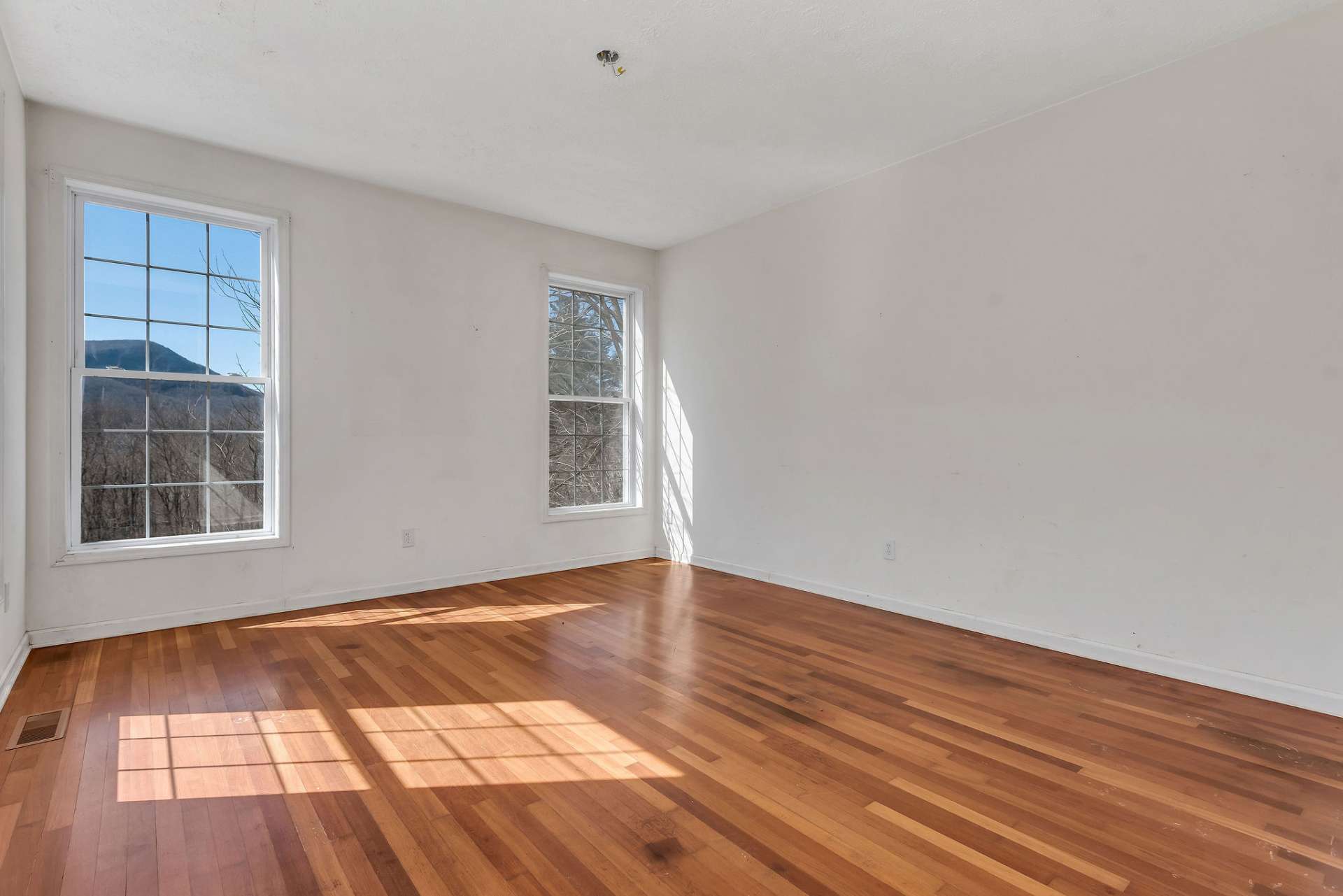 The living room is left of the foyer.