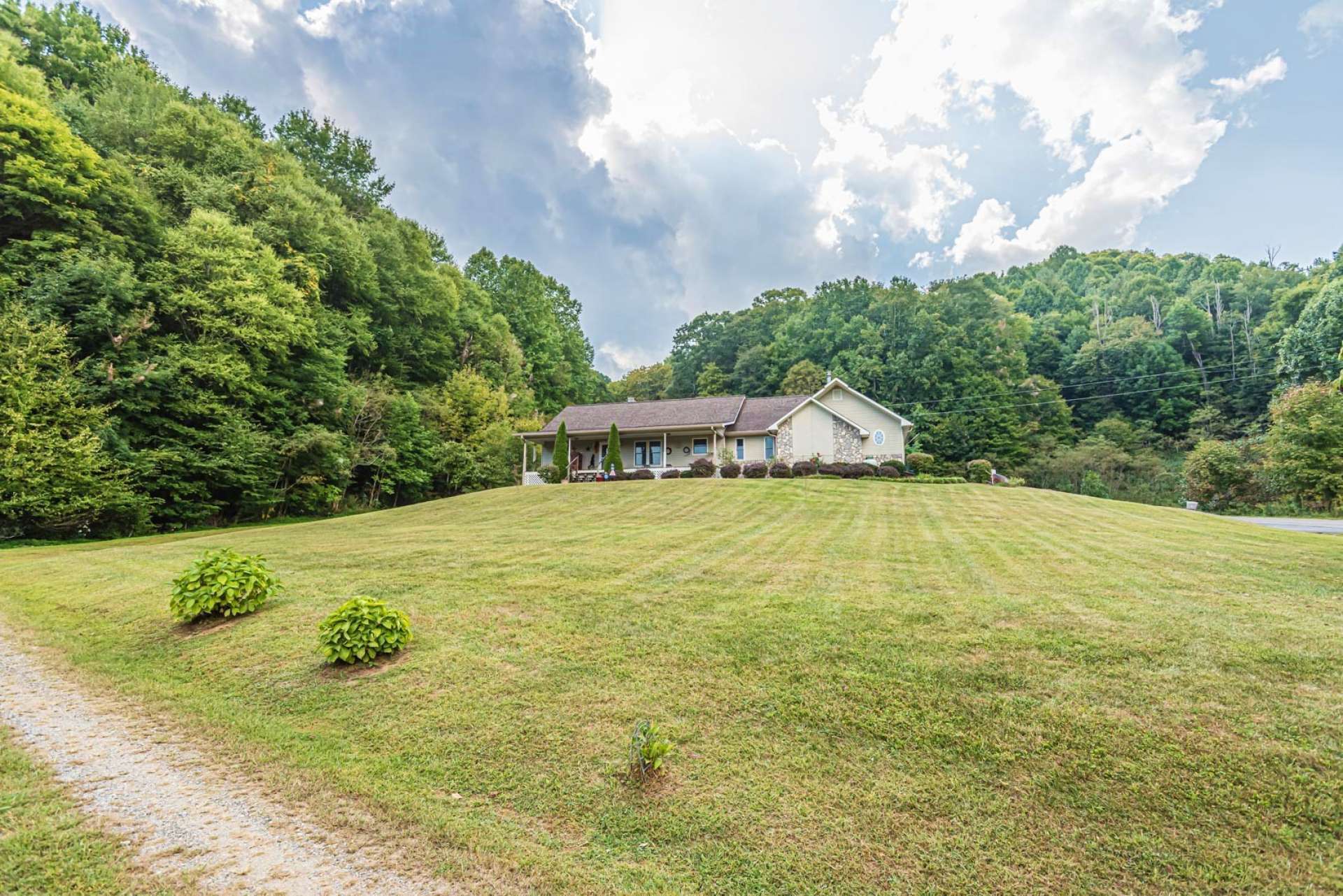 Sited to take advantage of the farm setting, the house welcomes you at the end of the private driveway.