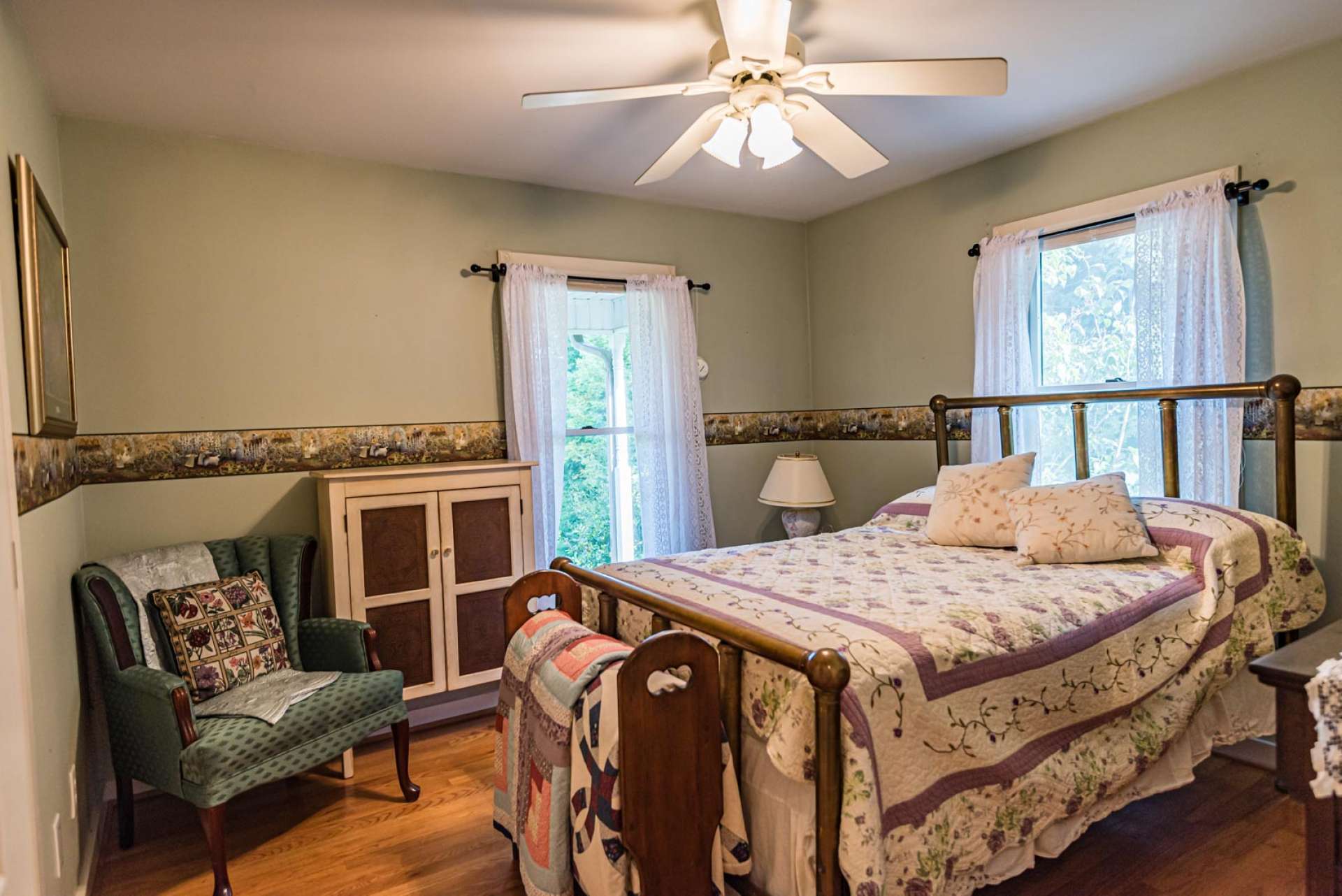 Two ample sized guest bedrooms share the second full bath.