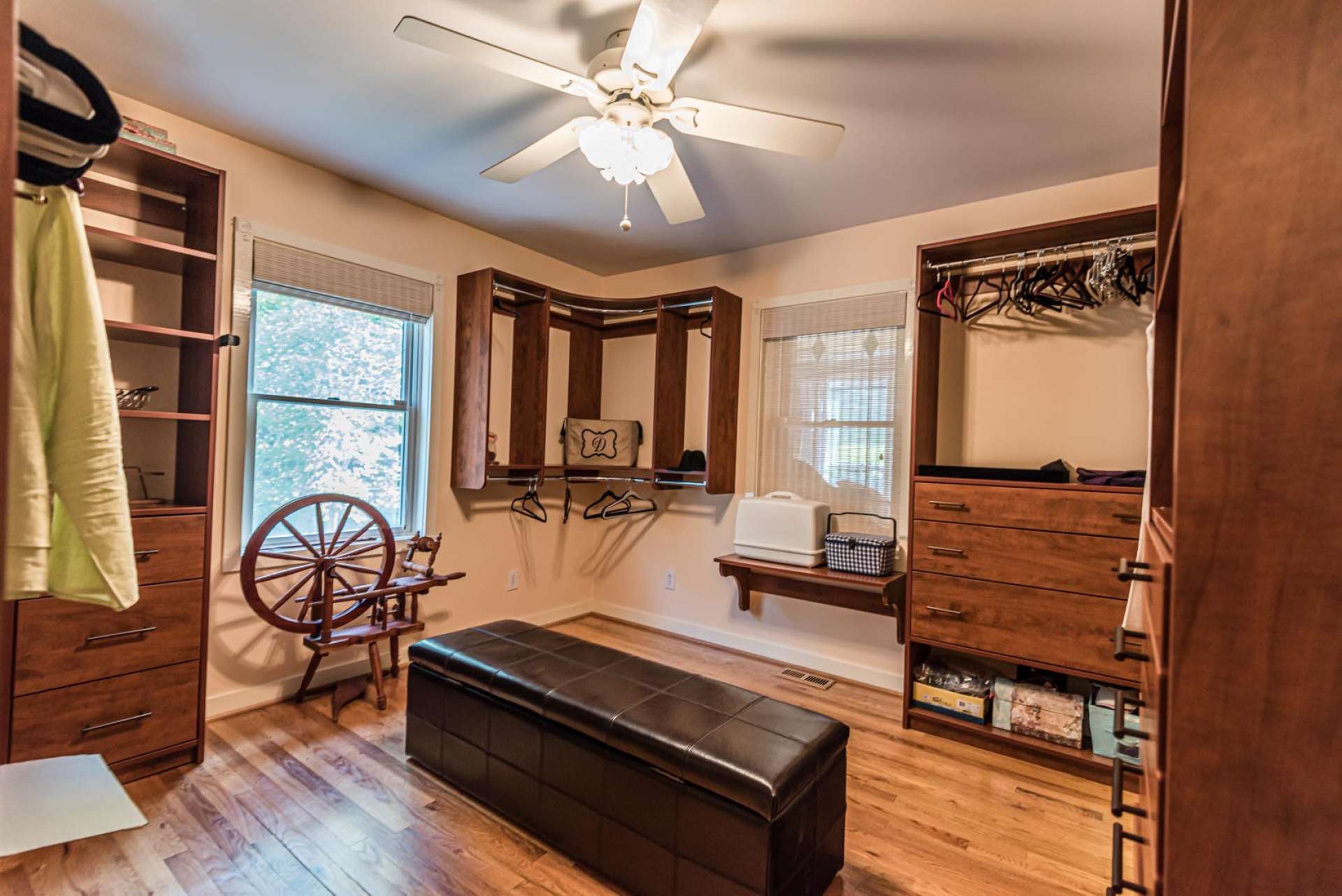 The second guest bedroom is currently utilized as a closet and dressing room.