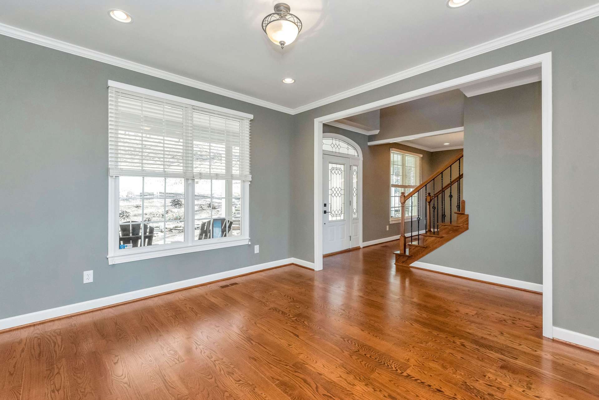 Versatile open room adjacent to the front door, originally conceived as a music room but offering a myriad of possibilities as a front parlor, small library, or home office. With its flexible layout and open design, this room is easily adaptable to the changing needs and preferences of its occupants.