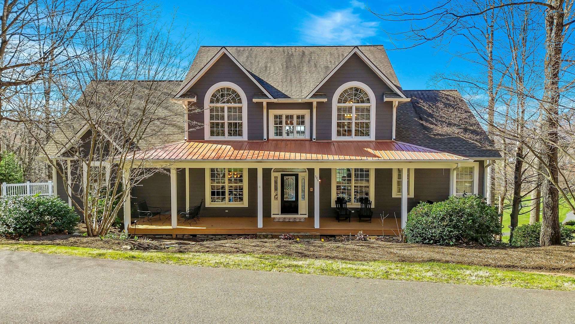 Craftsman-style home where timeless elegance meets modern convenience. Adorned with low-maintenance fiber cement board siding, this home boasts durability without compromising on charm. Adding a touch of sophistication, copper roofs grace both the front porch and rear deck, enhancing the home's curb appeal.