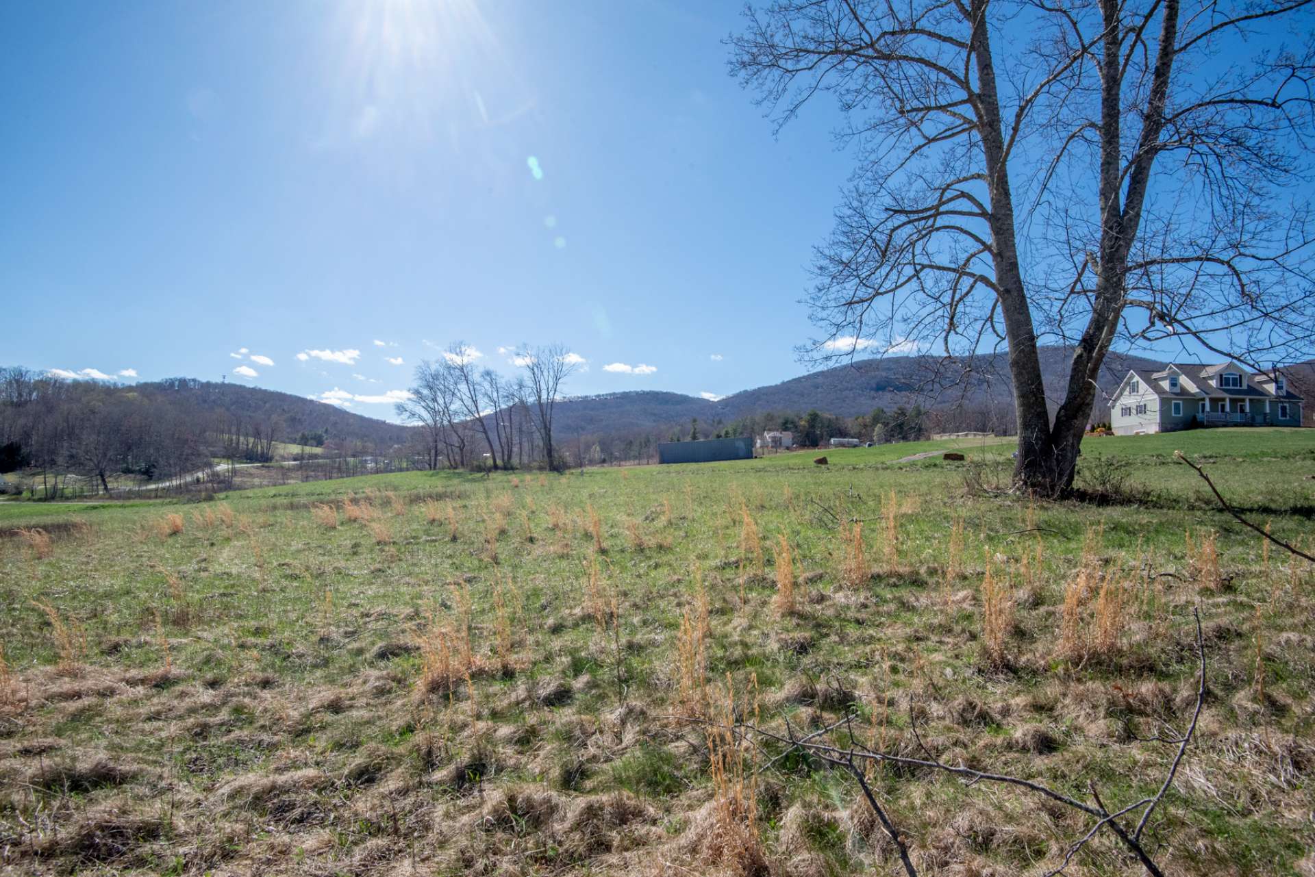 Beautiful lawn space to enjoy from the porches or deck on your custom mountain home.