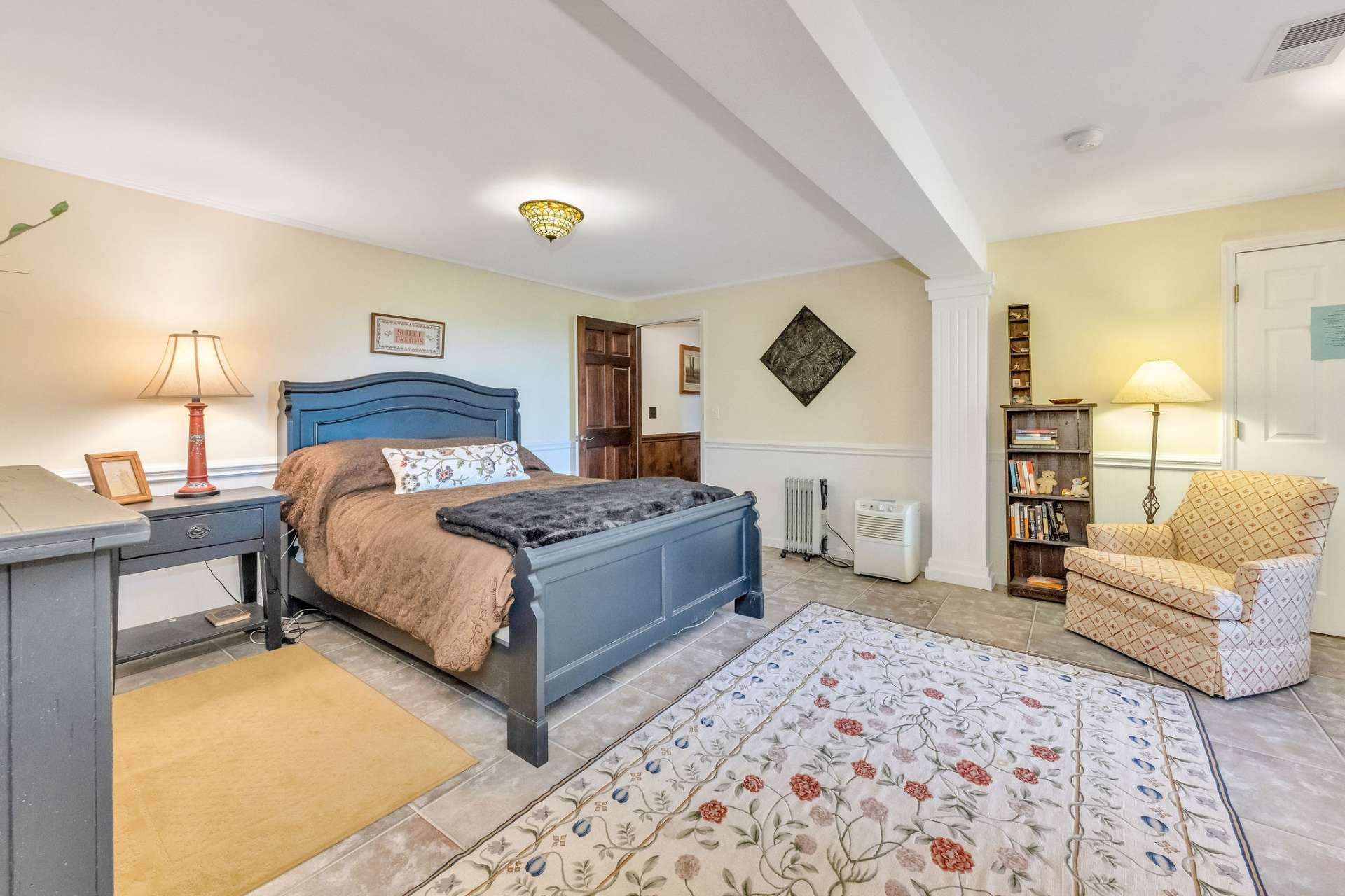This room features a walk-in closet and window seating with a view.