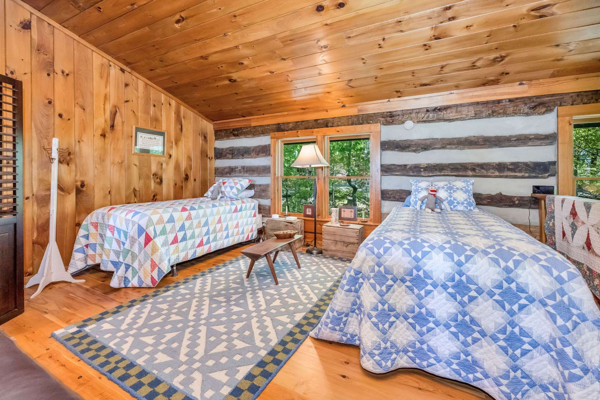 One side of the loft is set up with 2 twin beds.