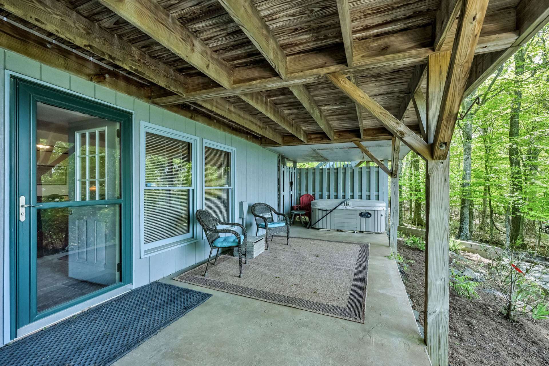 Step outside to enjoy a dip in the hot tub or relax by the fire pit area.