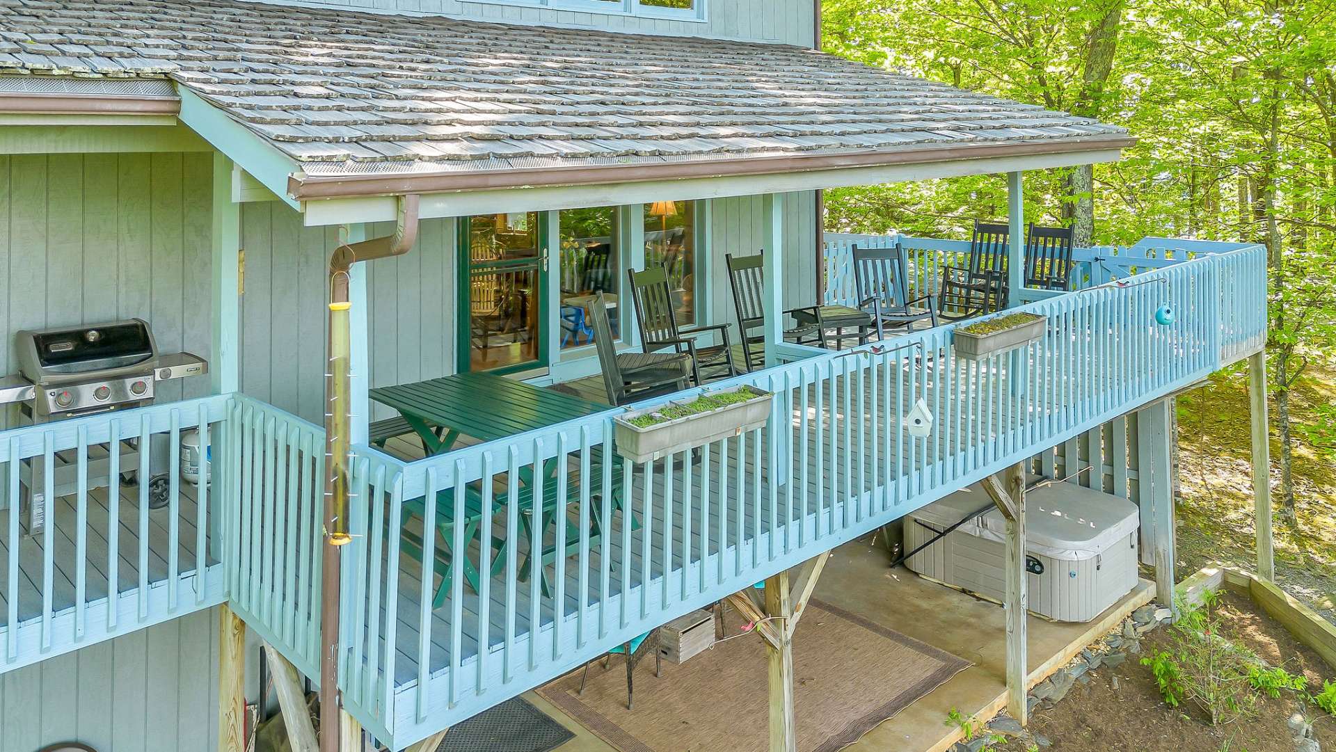 Dine al fresco or invite neighbors over for wine on the back covered deck. This space is perfect for any occasion, rain or shine.
