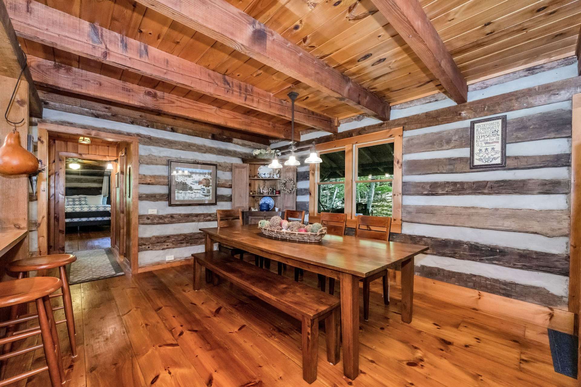 Ideal for entertaining, the expansive dining table offers ample space for festive dinners and holiday feasts.