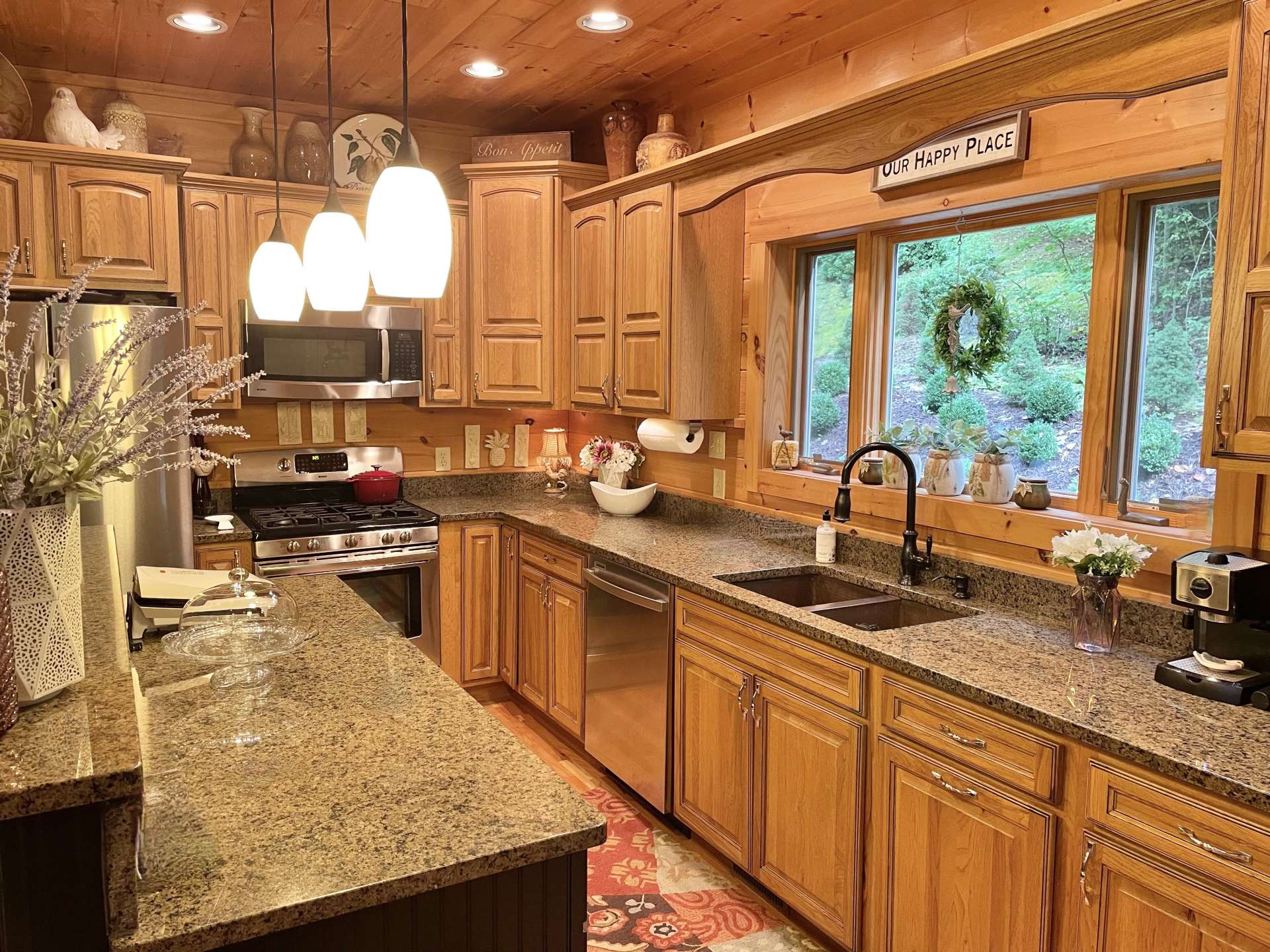 Kitchen with granite countertops and stainless appliances.