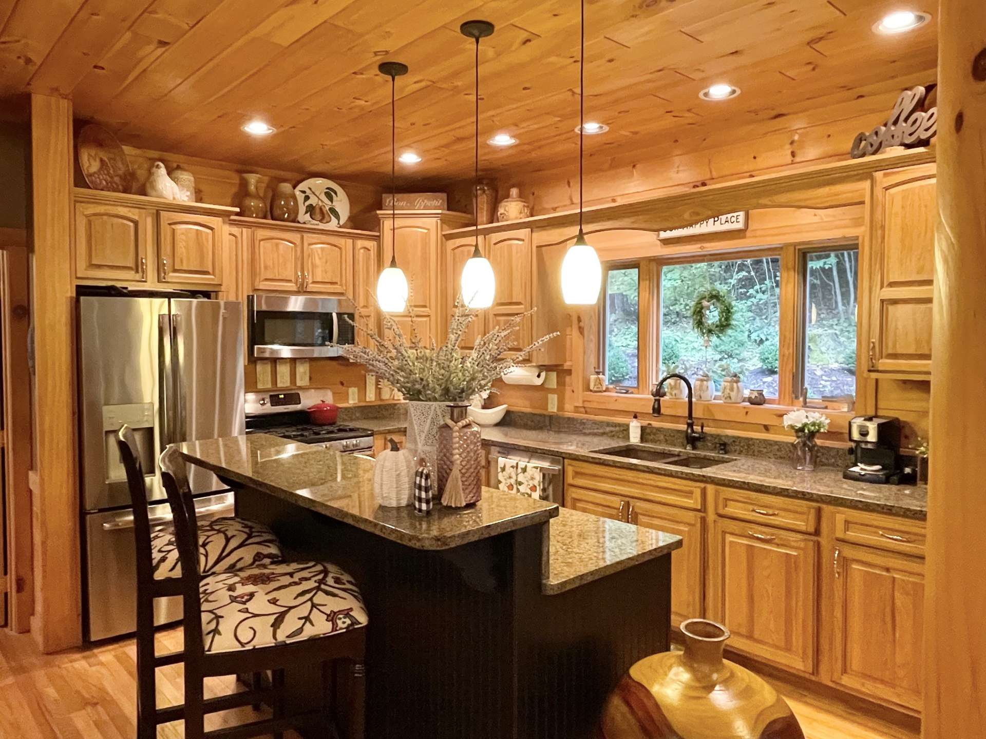 Kitchen open to the family room and dining room.