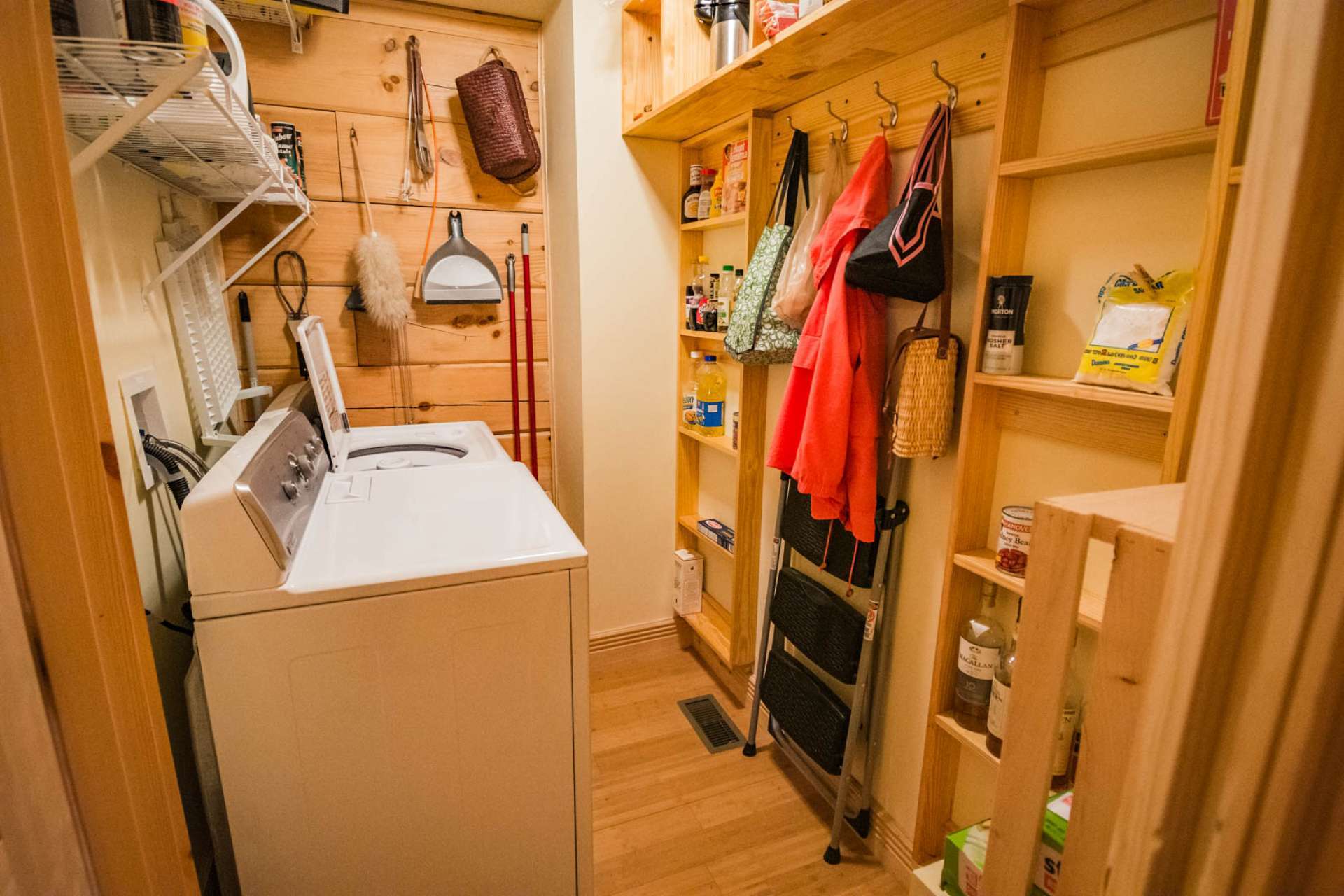 Conveniently located on the main level, the laundry room also offers additional storage space.