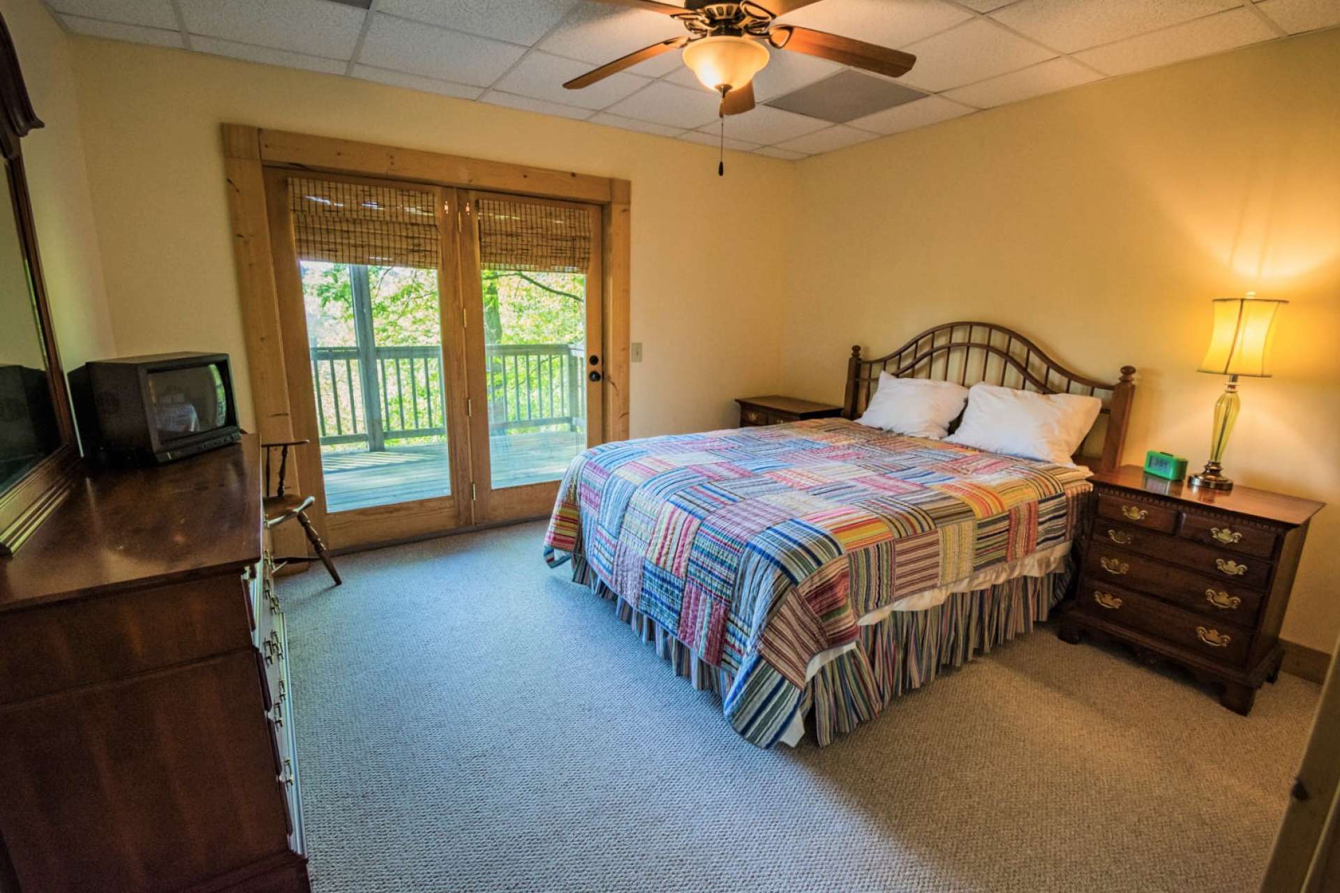 This bonus room on the lower level is currently utilized as a 4th bedroom and offers a closet along with private access to the full bath and lower covered deck.