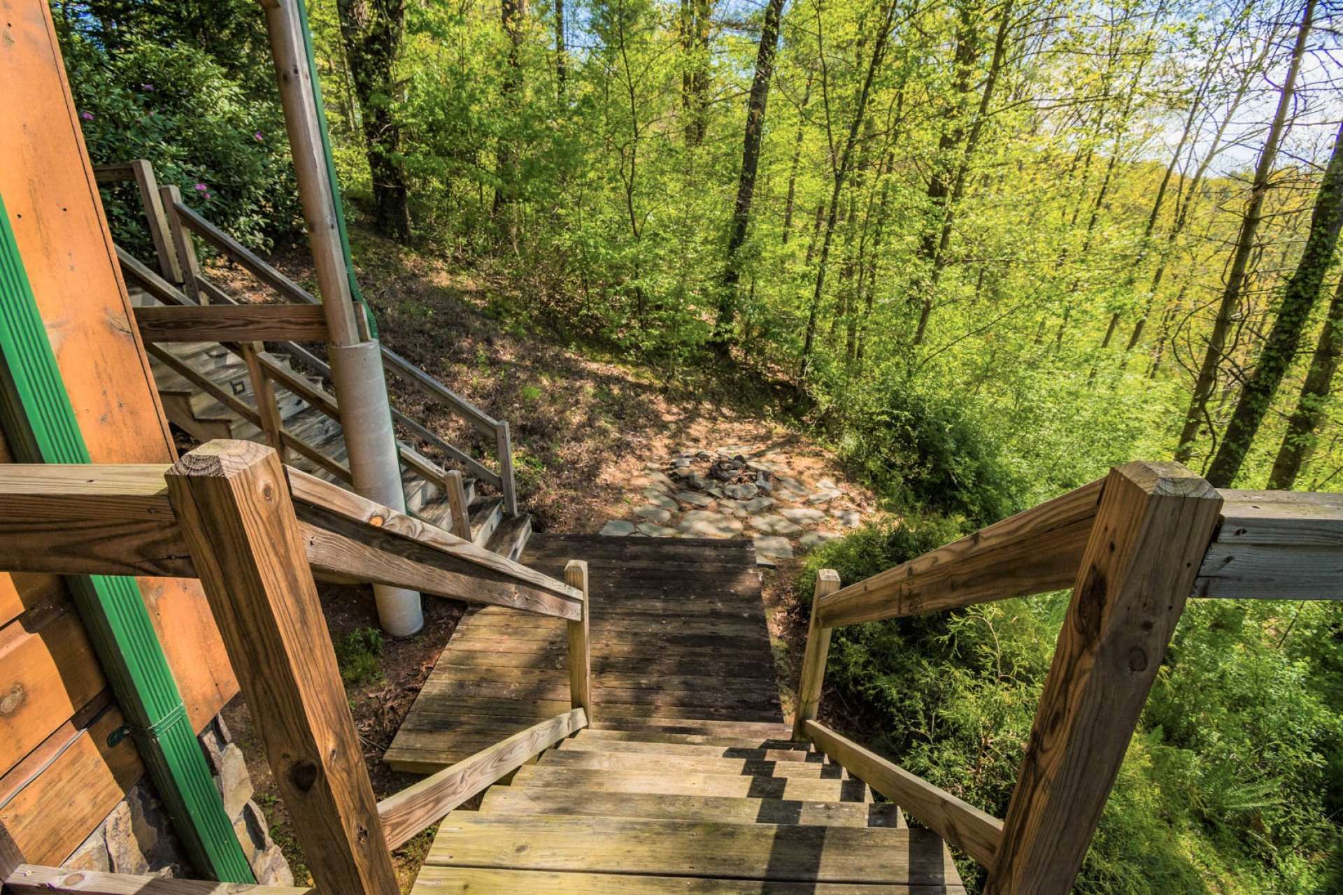 The firepit area is easily accessed from the lower level. What a great outdoor space for roasting hot dogs, making smores, or just relaxing while making memories of time spent in the North Carolina Mountains.