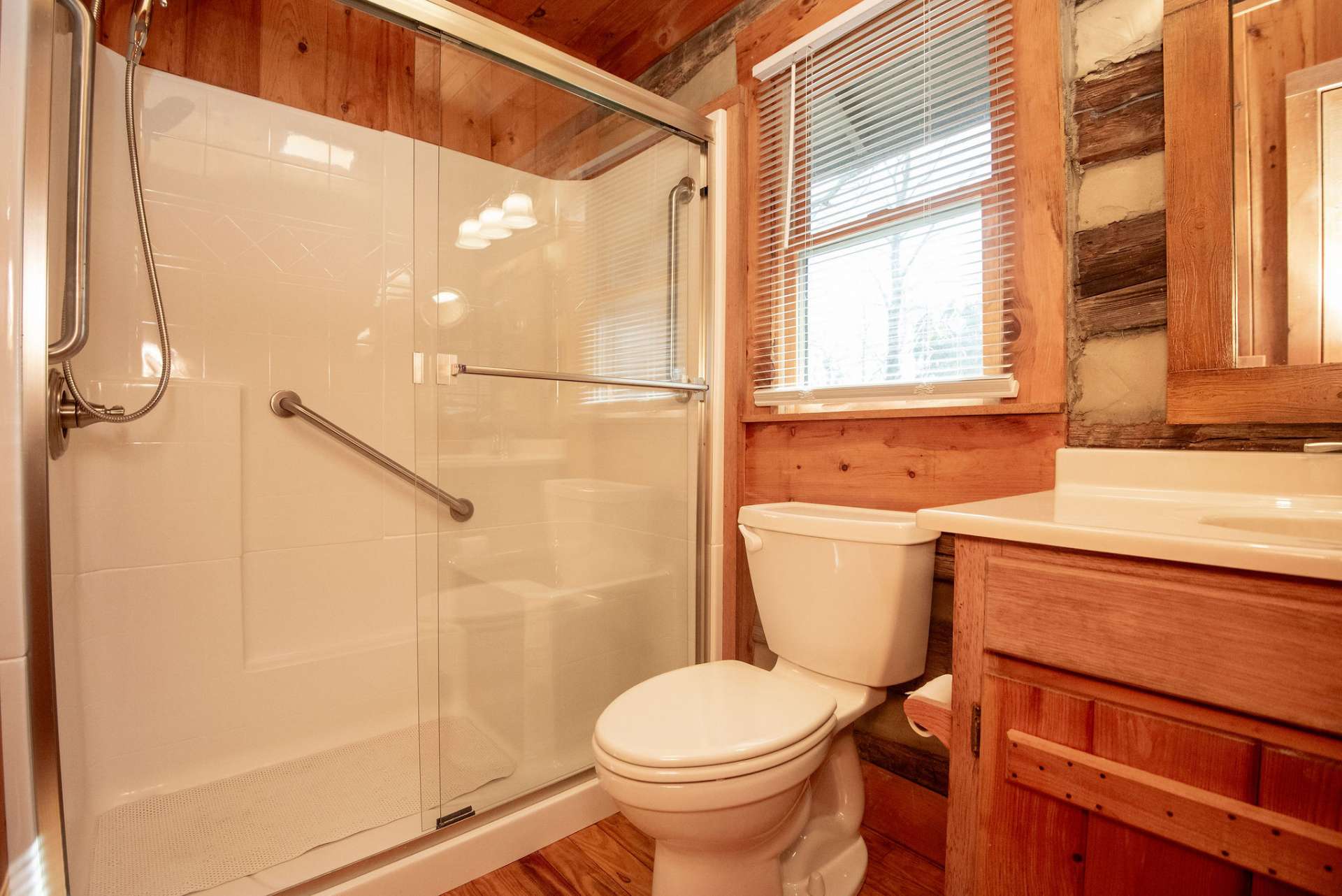 Primary full bath with easy walk-in shower.