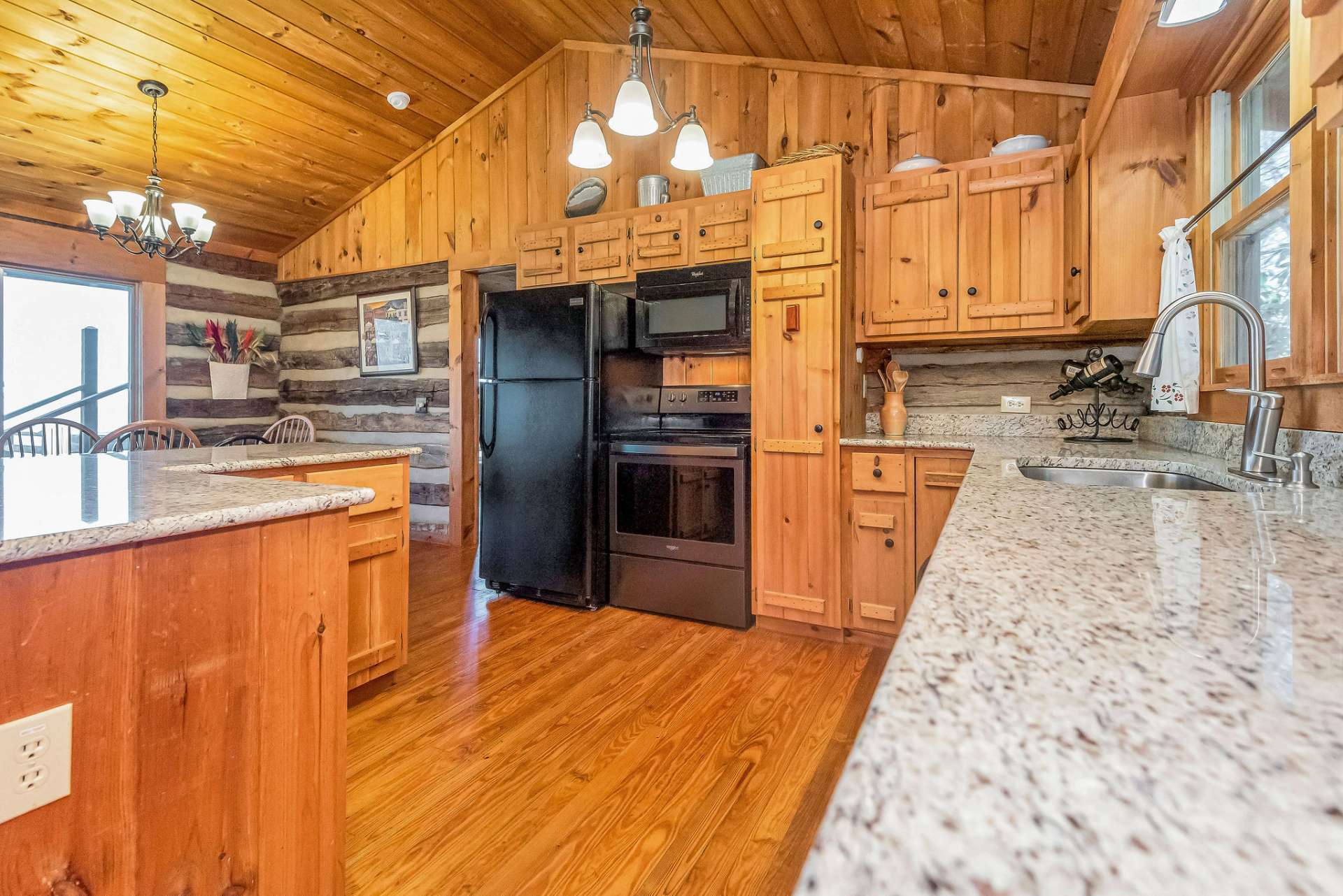 The kitchen has ample prep space with granite counter tops.