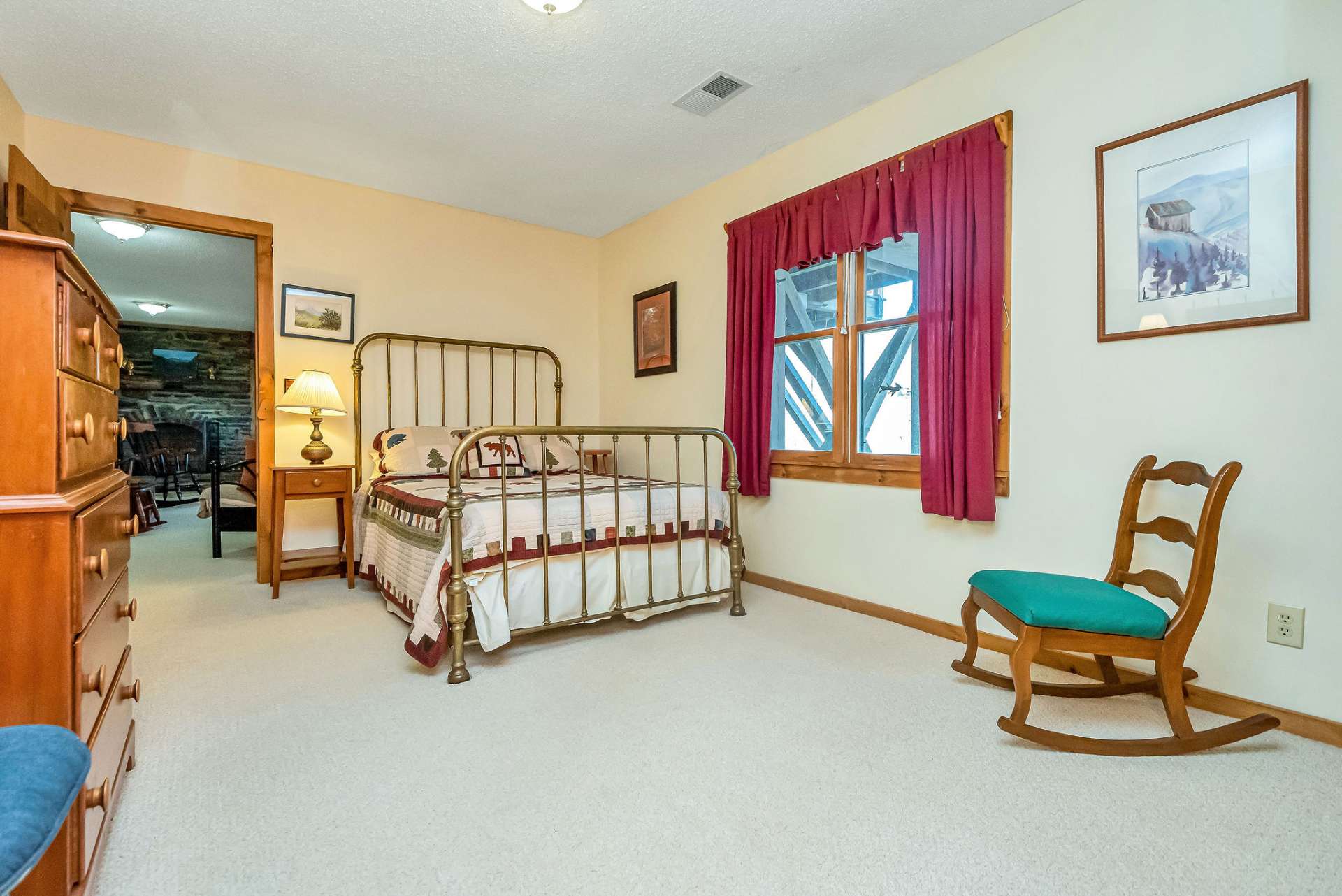This well-appointed bedroom with a full bath and convenient laundry facilities round out the lower level.