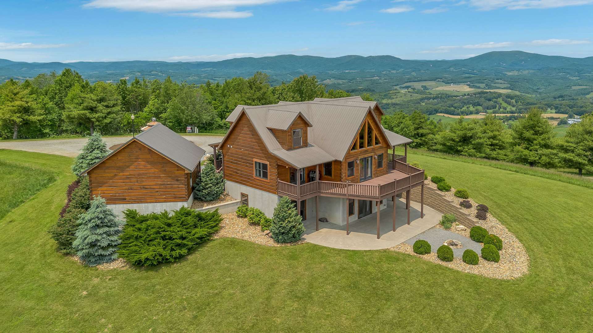 Well-crafted log siding, freshly stained just two years ago, pairs beautifully with a durable metal roof and high-quality Pella windows for lasting charm and performance.