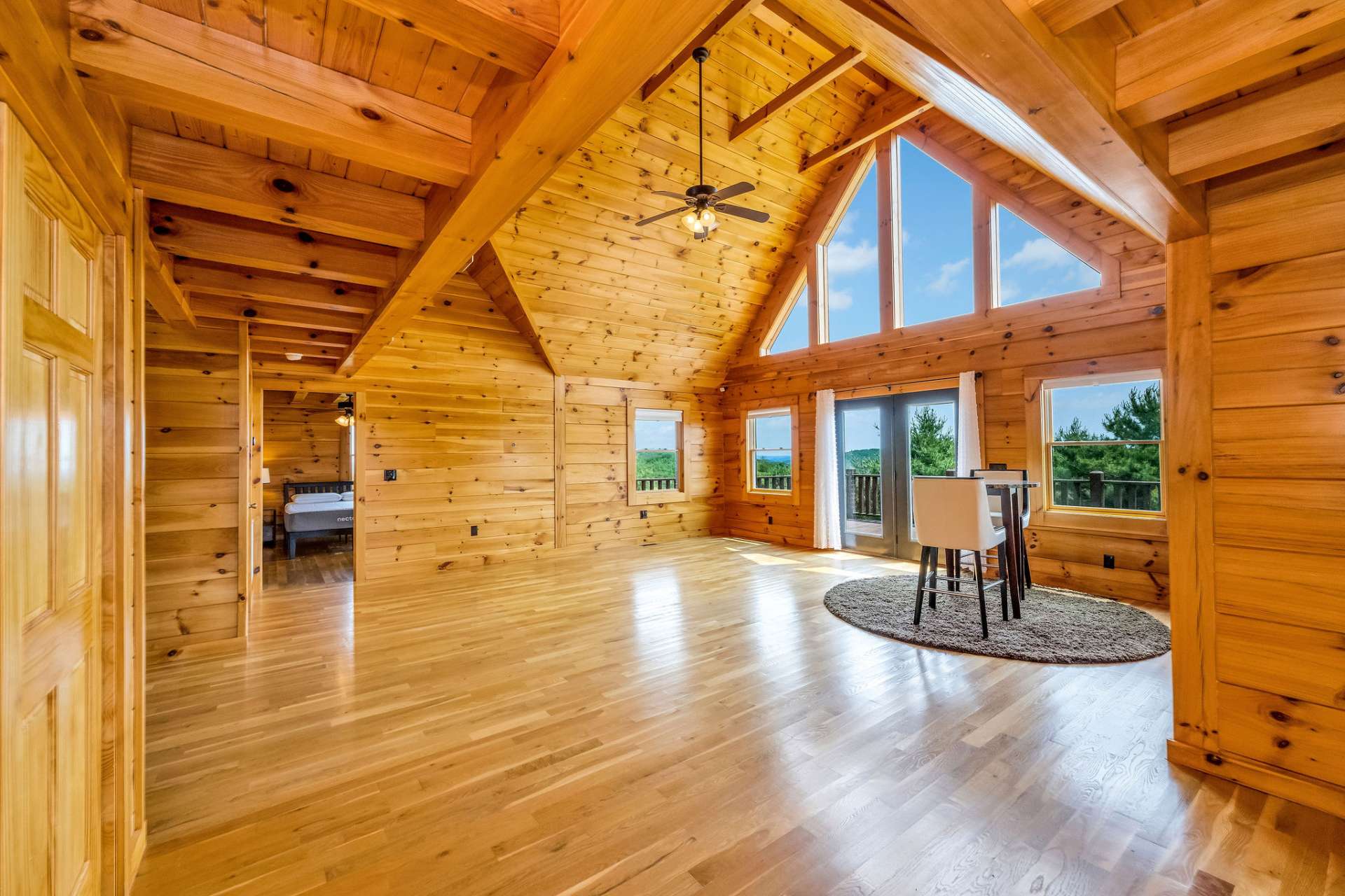 Wall of windows floods the space with light while perfectly framing the breathtaking long-range mountain views.