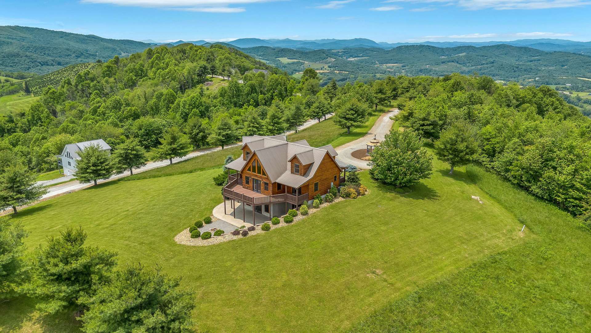 Suitable for full-time living or a vacation retreat, this home is just five minutes from Sparta, 45 minutes from Elkin and West Jefferson, and less than two hours from Winston-Salem and Charlotte.