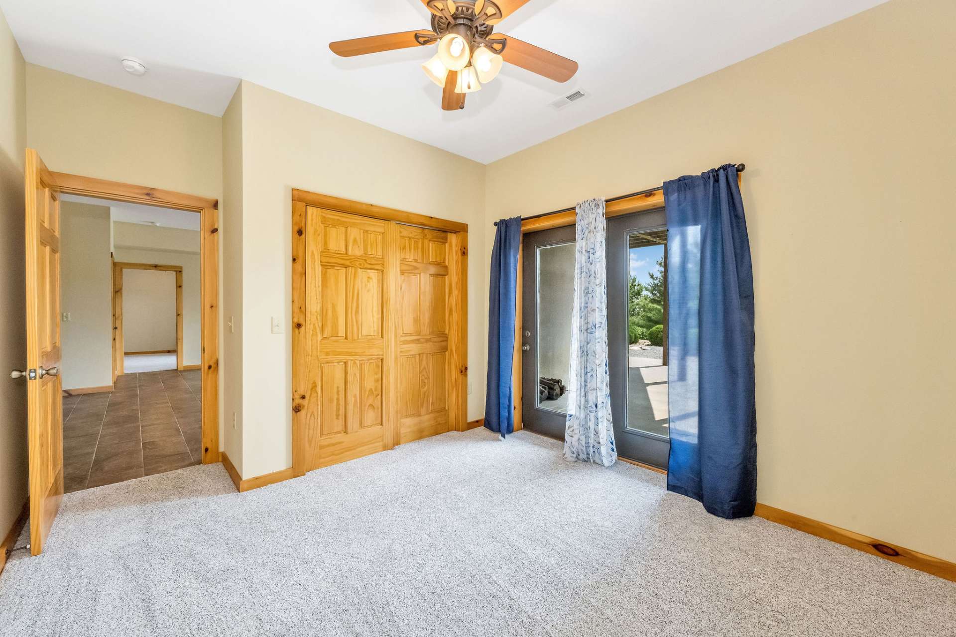 Enjoy easy access to the patio from this inviting room as well.