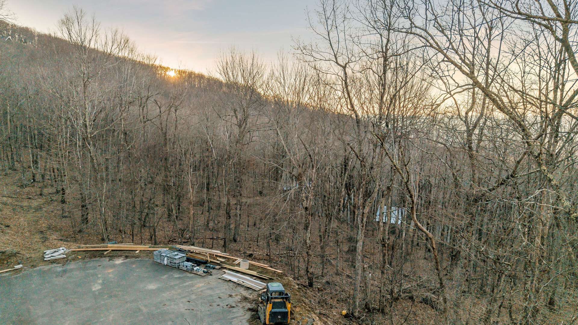 Aerial view of the property is to the right at the end of the cul-de-sac