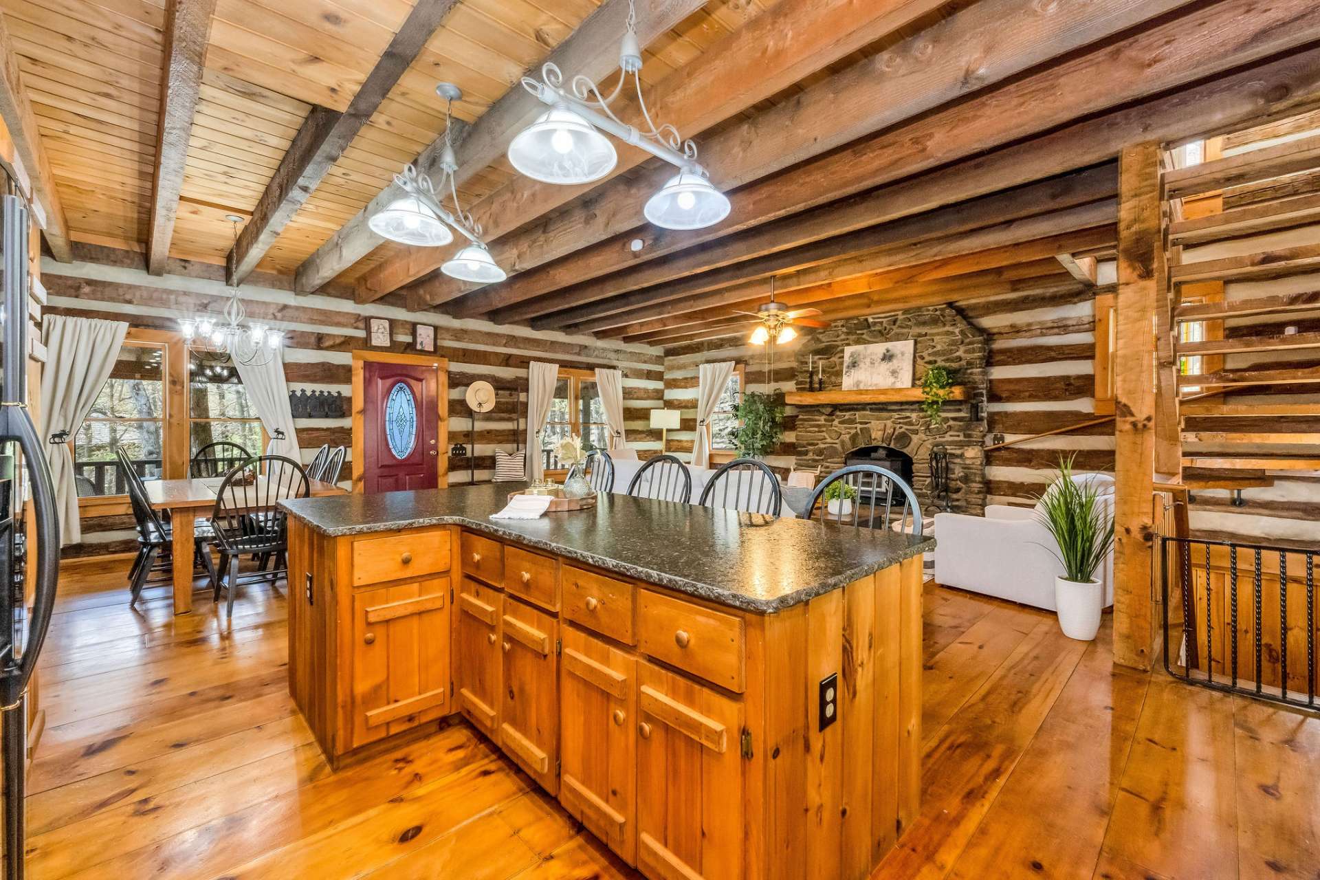 Abundant storage, generous workspace, and ample outlets for appliances make this kitchen functional and best of all, the chef can stay connected with guests while preparing meals.