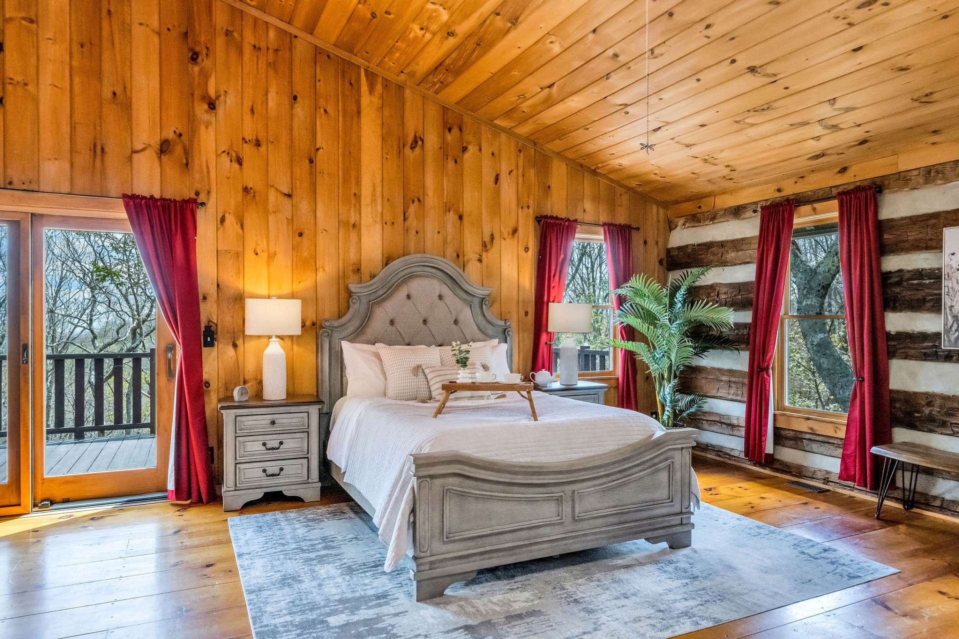 Bountiful windows and a sliding glass door, along with vaulted ceilings, make this suite bright and cheerful.