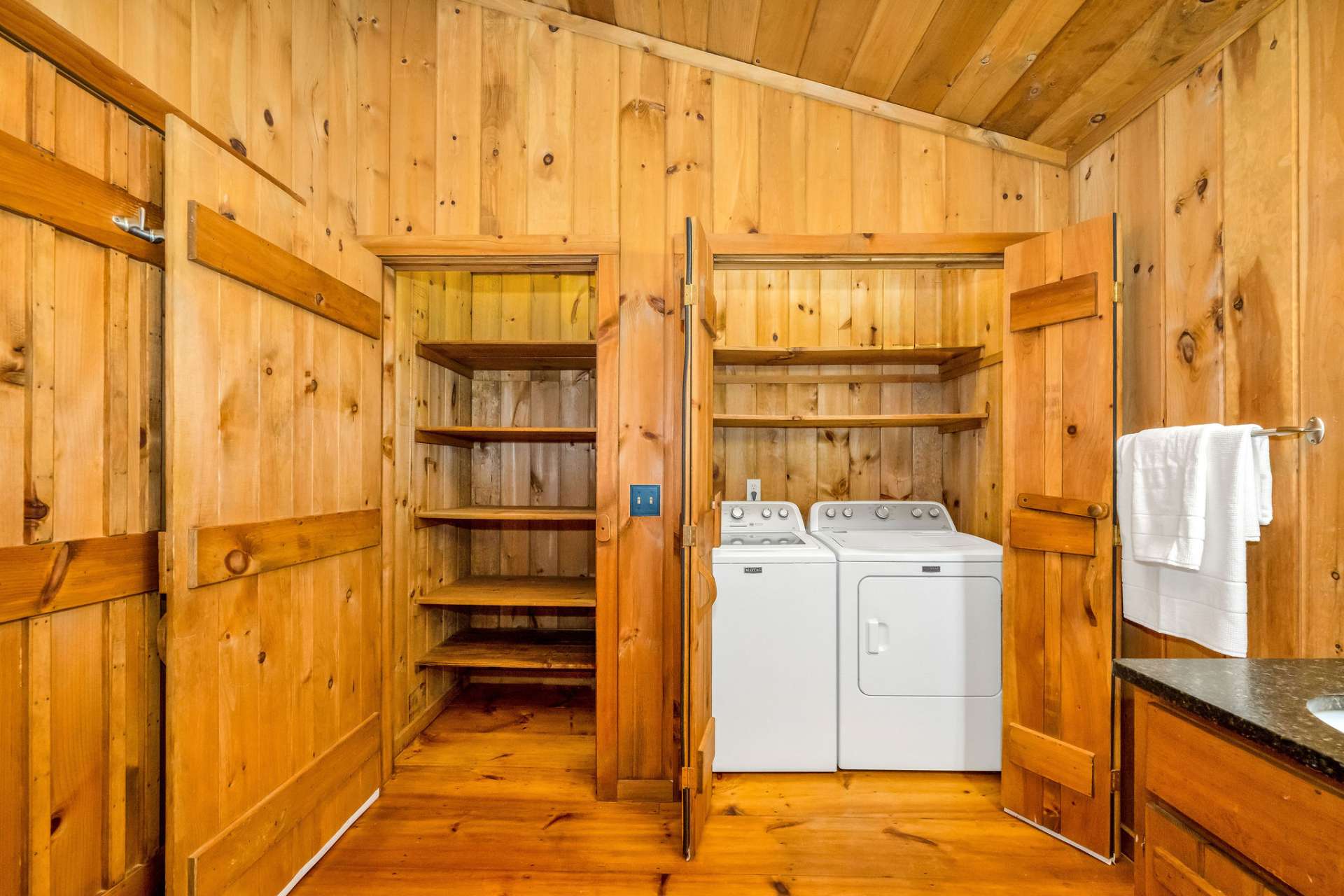 A convenient linen closet and washer & dryer closet complete the primary bath.