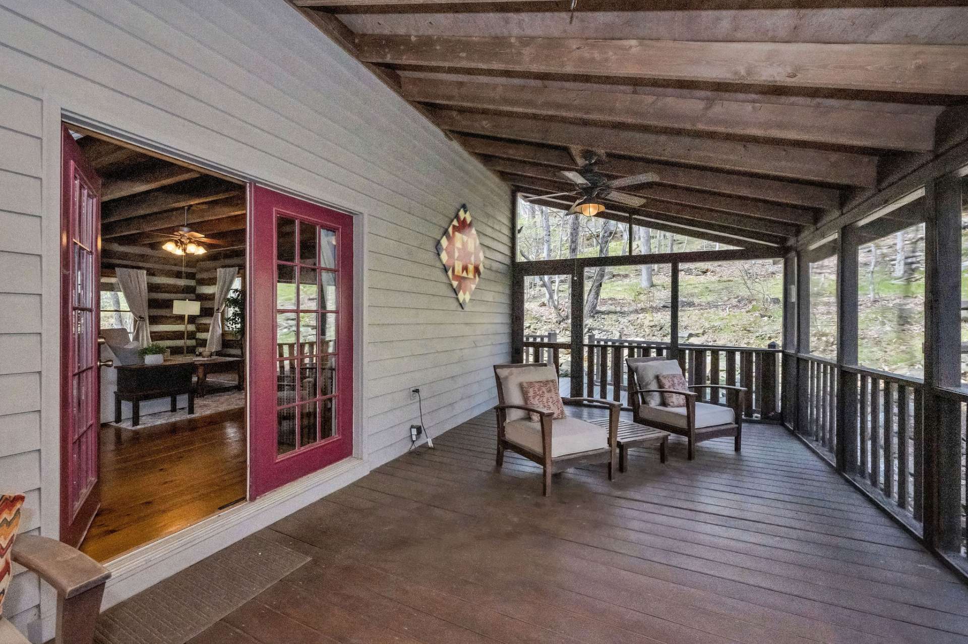 The screened porch expands your living space by 335 sf with room for outdoor dining, entertaining, or simply unwinding while enjoying the sights and sounds of the mountain.