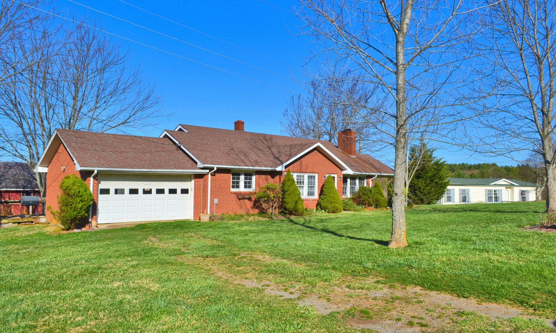 This 10 acre farm along the Blue Ridge Parkway is a young farmer's dream.  Complete with two homes, barns, outbuildings, pastures, views, and spectacular mountain setting in the Hillsville area of Carroll County, this property is ideal for your Virginia mountain farm or retreat.