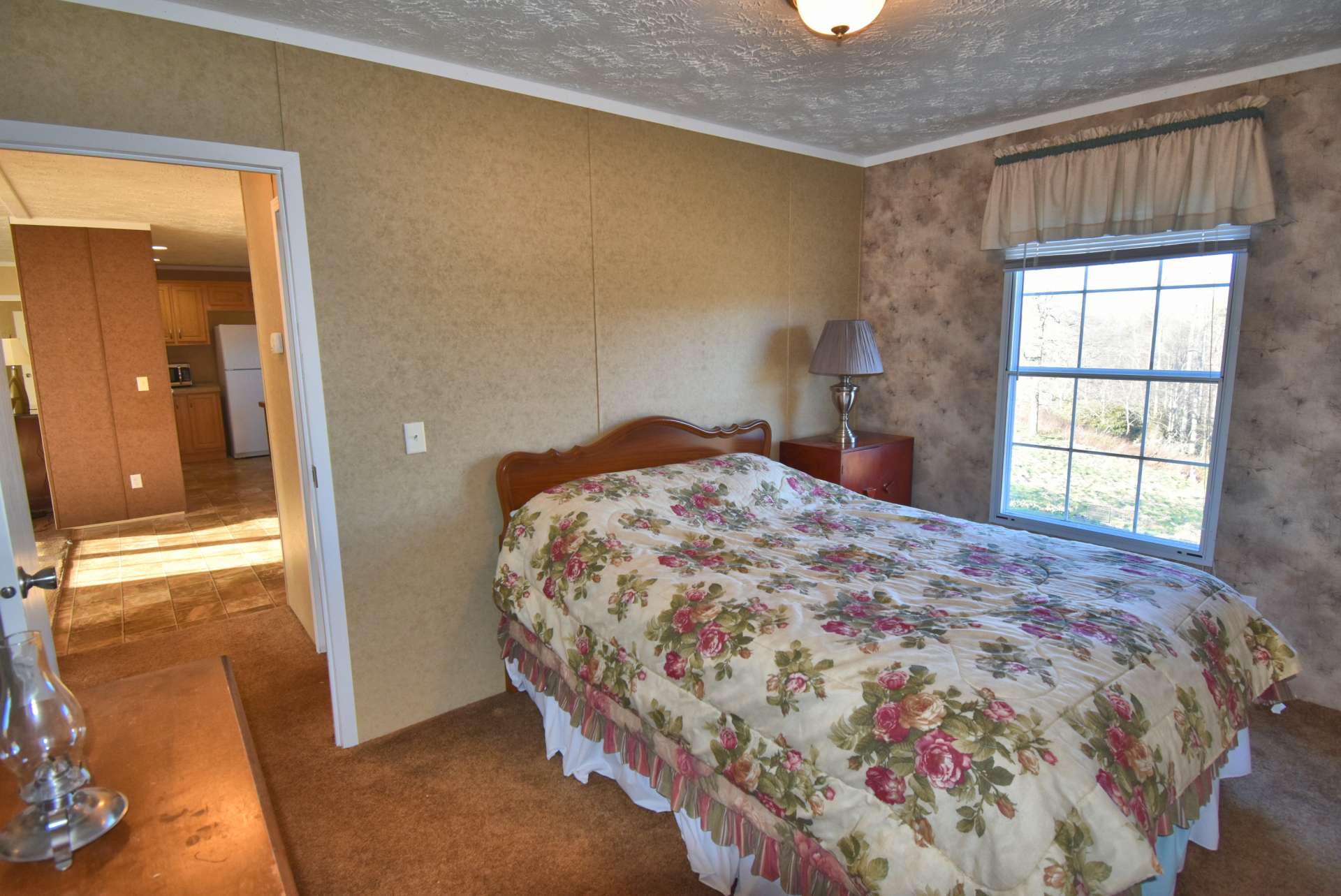 All of the bedrooms have walk-in closets. A second full bath completes the floor plan.