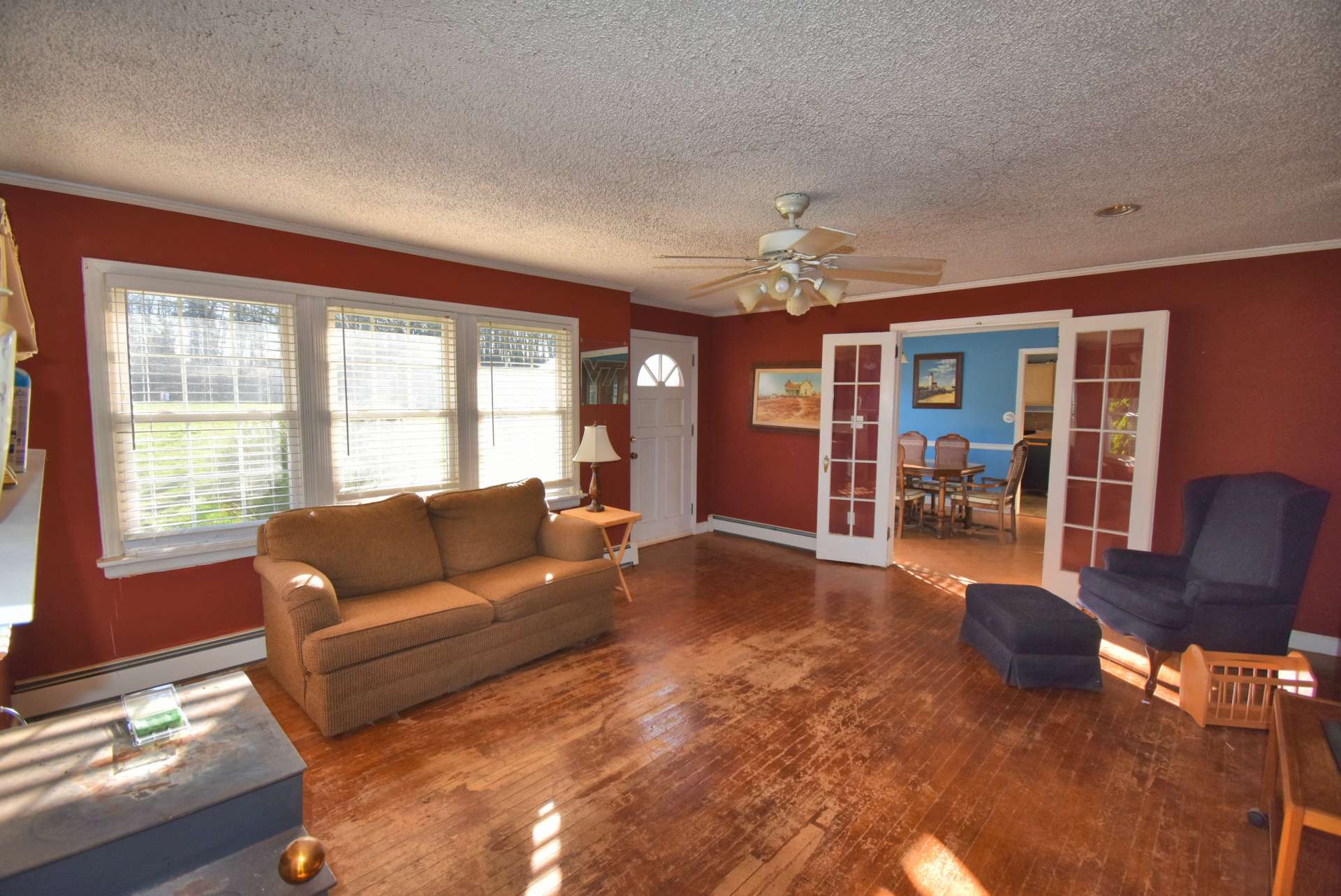 Large windows fill the room with natural light.