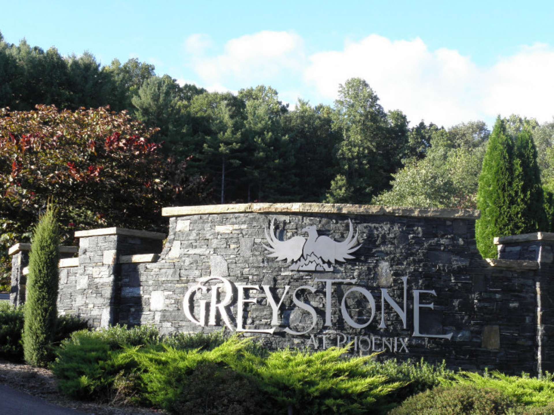 A grand gated entrance with custom detailed structure and water display welcomes residents to their unique mountain home community. Each homesite in Greystone offers access to the common greenways and walking trails.