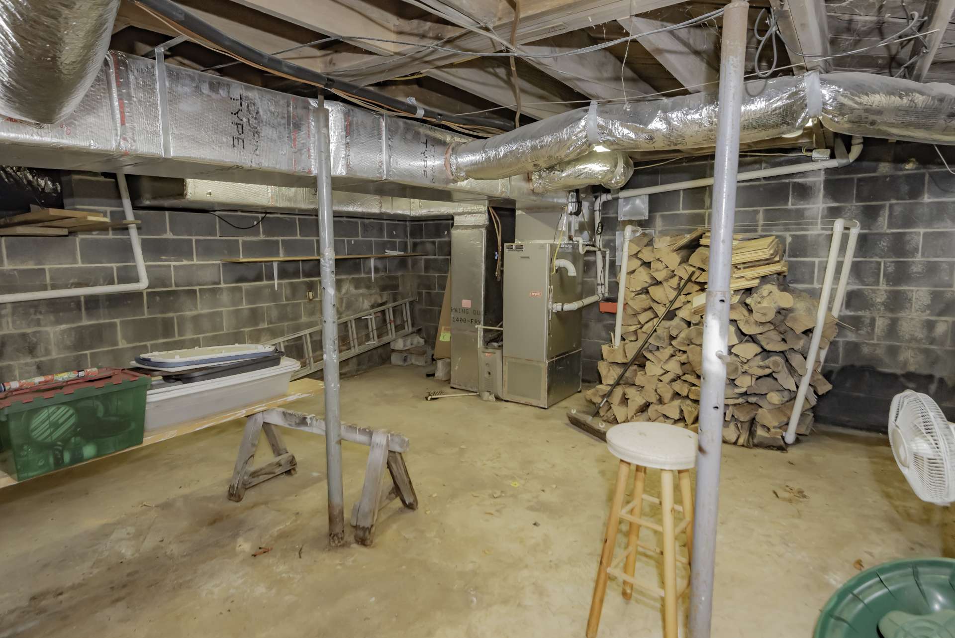 A partial unfinished basement provides plenty of space for storage or workshop space.
