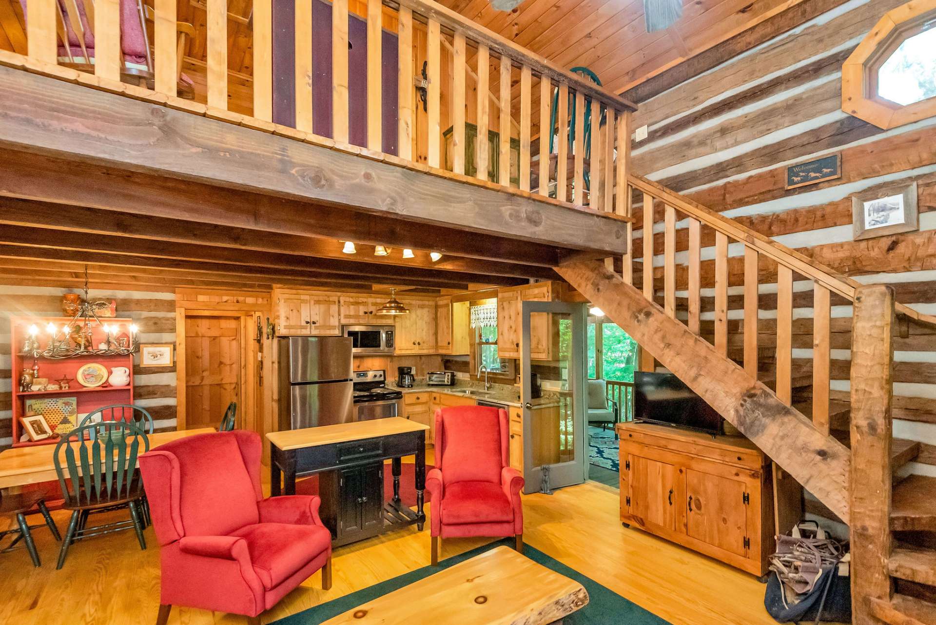 Hand-hewn stairway leads to the loft.