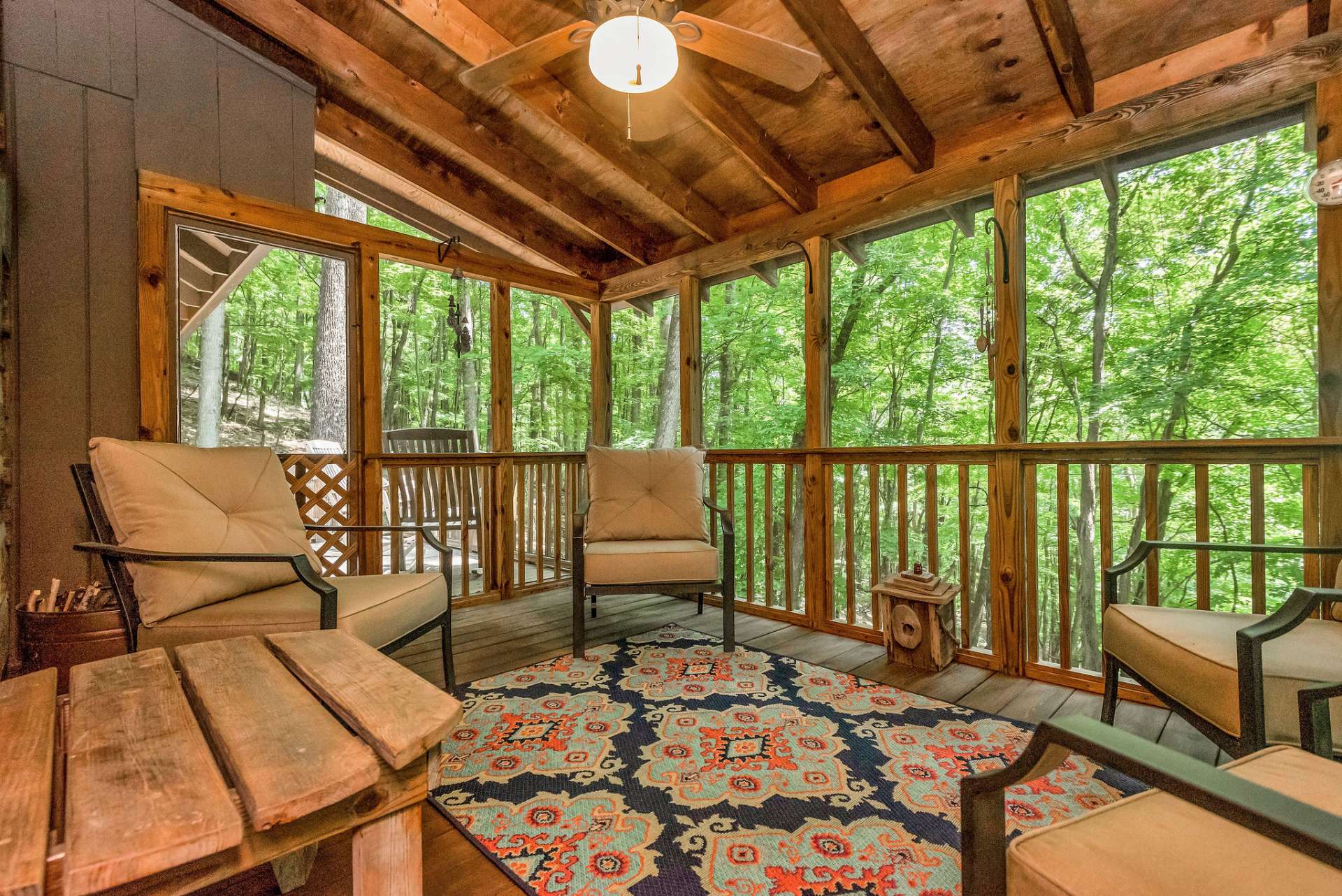 Step out to the screened outdoor living area - great for entertaining during the summer.