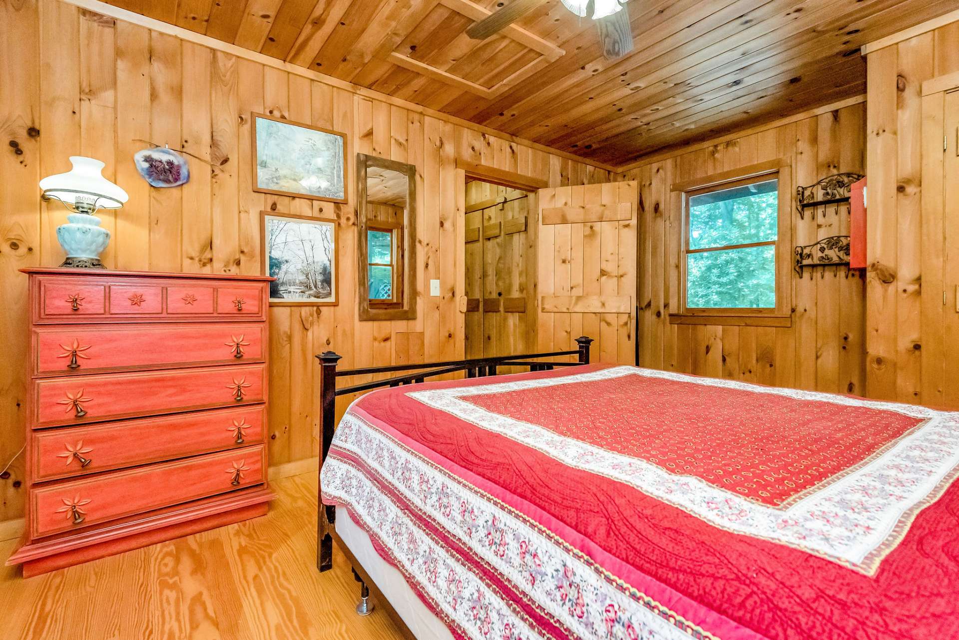 Laundry and main level bath are adjacent to the primary bedroom.