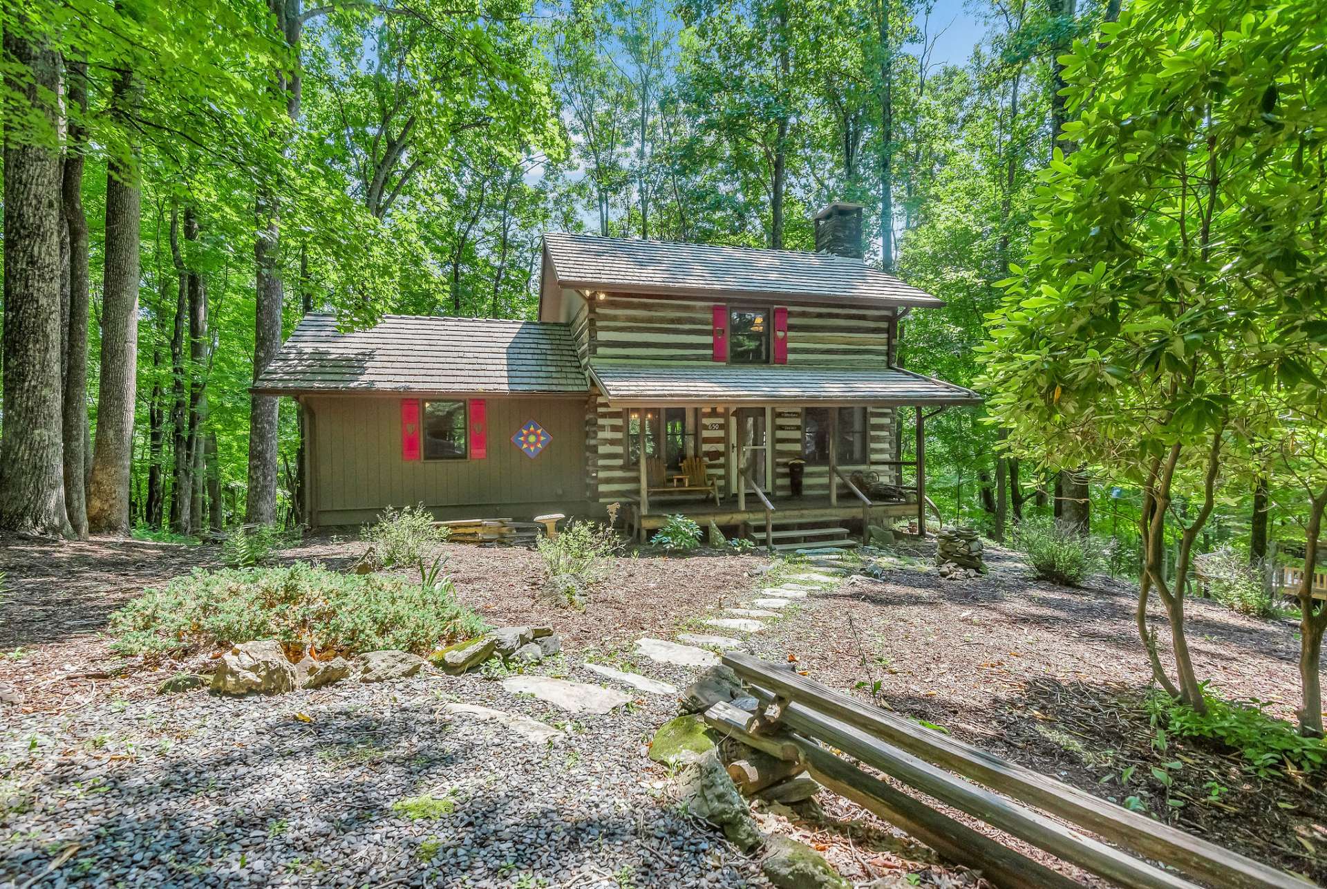 This quaint log home is the getaway dreams are made of!