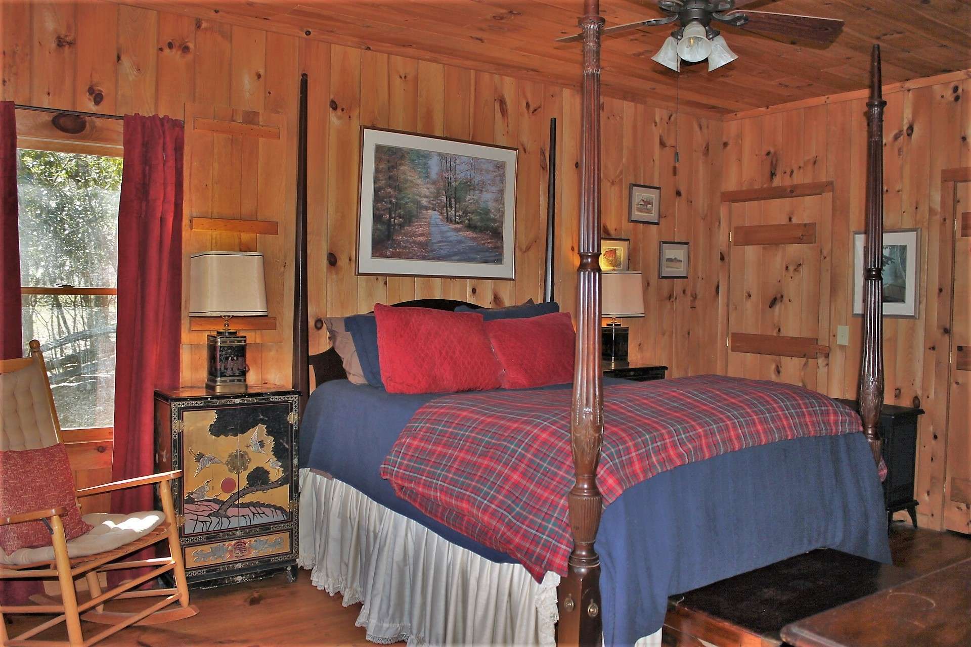 There is an additional large guest bedroom on the lower level with walk-out access to a covered deck.