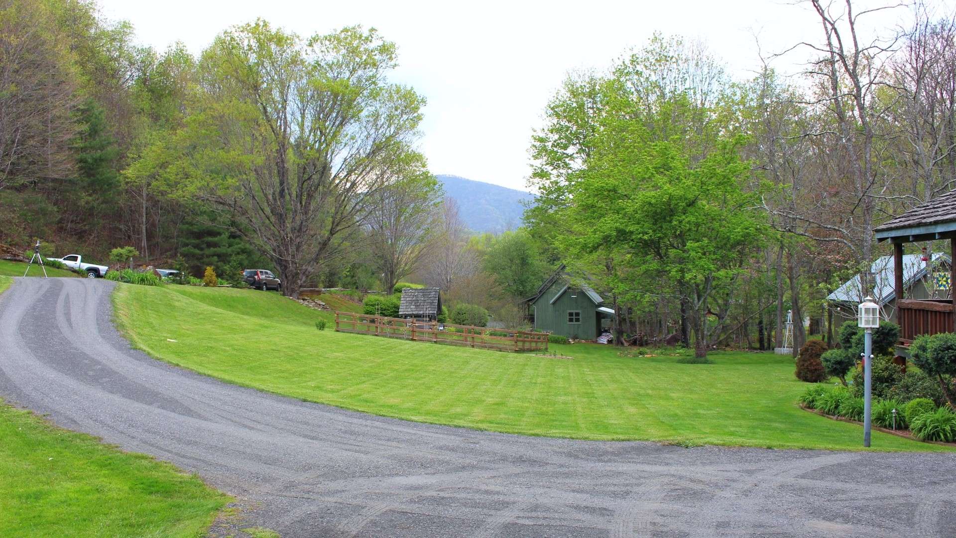 Accessed by a private drive, this charming 2-bedroom, 2-bath log cabin is constructed from old logs and loaded with mountain log cabin craftsman style features and character.