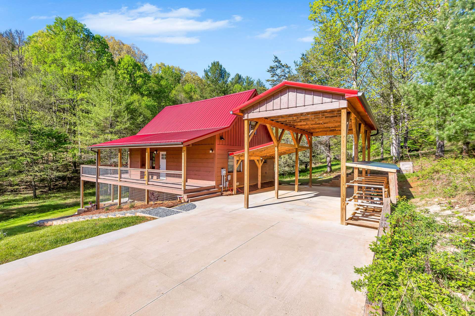 This home is complete with an RV shelter and full hookups, catering to the needs of camping enthusiasts.