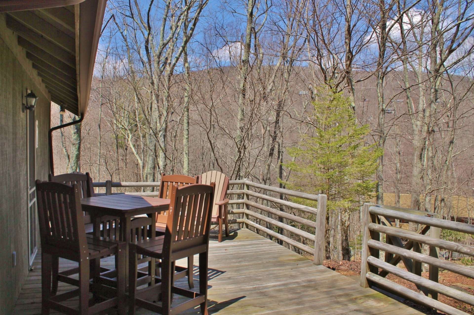 The open back deck is perfect for outdoor dining or quiet reflection of the day's activities.