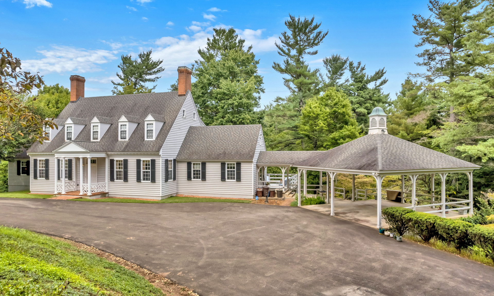 This expansive home has over 5,000 square feet of finished living space that includes gracious living and entertaining spaces. Another notable feature is the attached covered carport and plenty of driveway parking space.