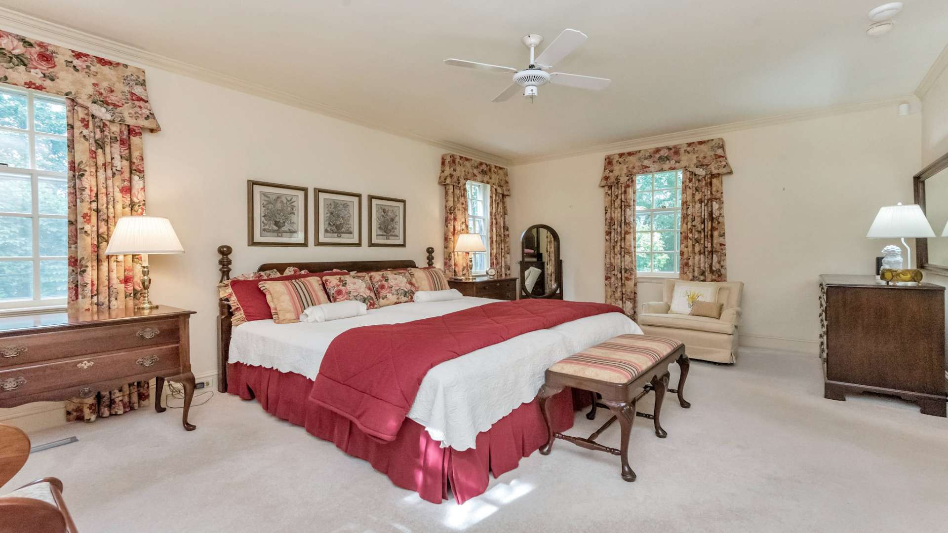 The primary master suite is conveniently located on the main level and offers a relaxing retreat at the end of the day. The private ensuite bath includes separate walk-in closets, a soaking tub, and a separate shower.