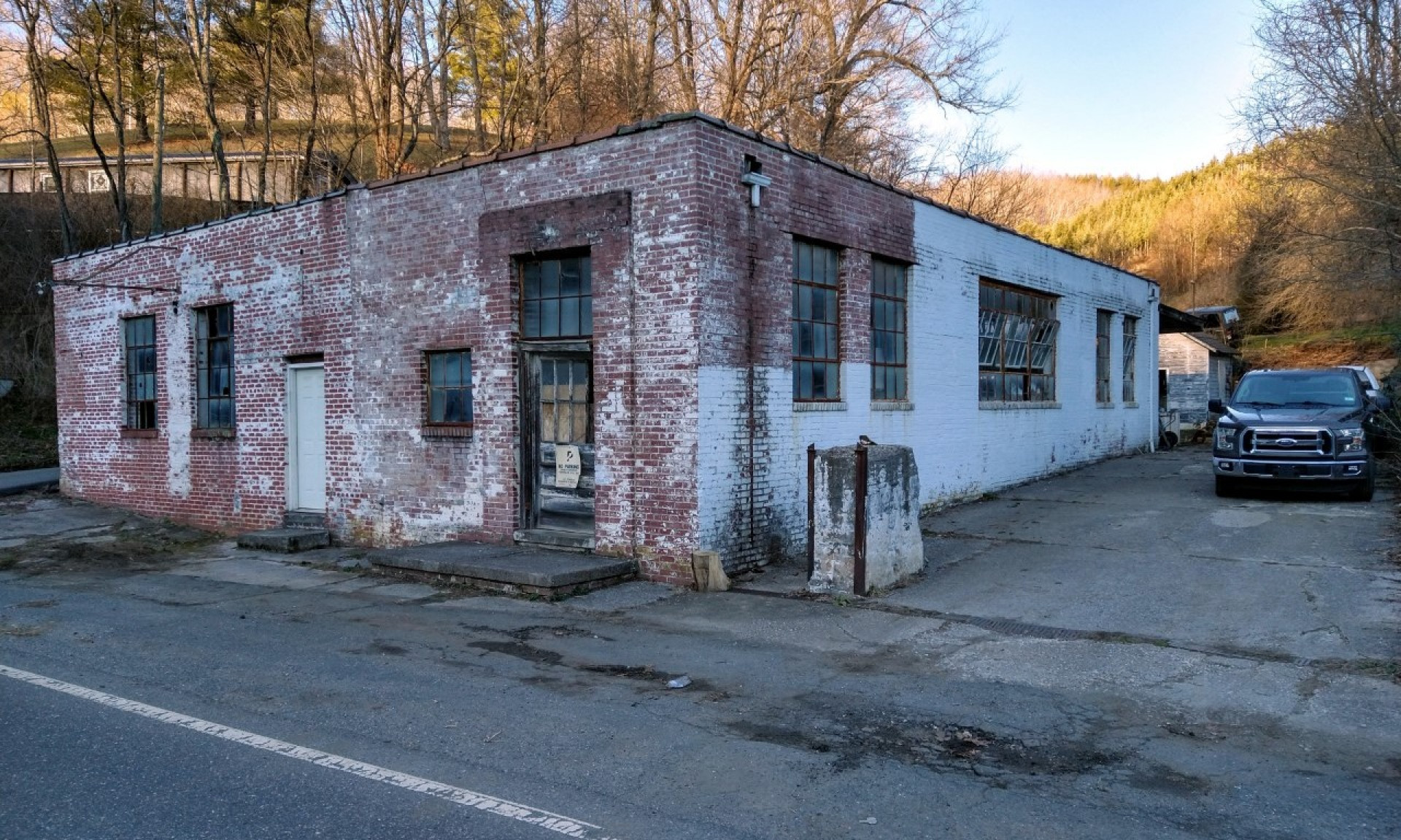 On a quarter-acre lot across the street from Lansing Creeper Trail Park, this 3000 sq. ft. building dates circa 1930, originally built as a cheese factory.