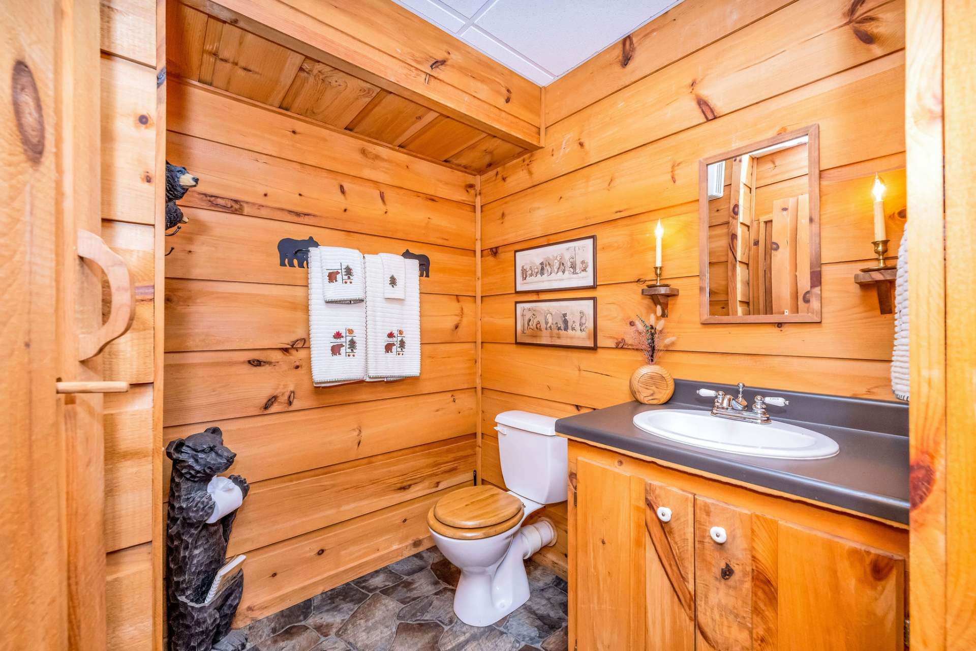 The lower level offers a charming half bath.