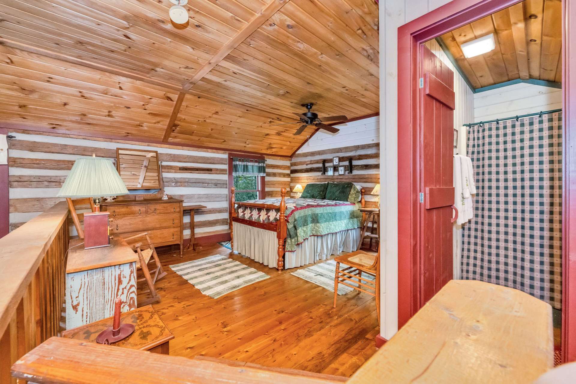 The loft bedroom will charm your guests with its spacious design.