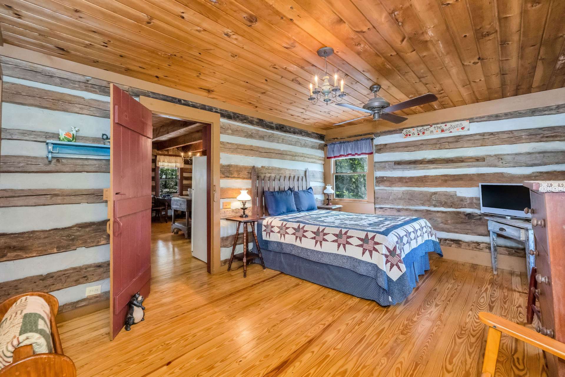 The main level primary creates a private retreat for rest and relaxation after the days spent shopping, playing a round of golf, listening to music at the winery, hiking, floating the New River and all the other exciting activities of the High Country.