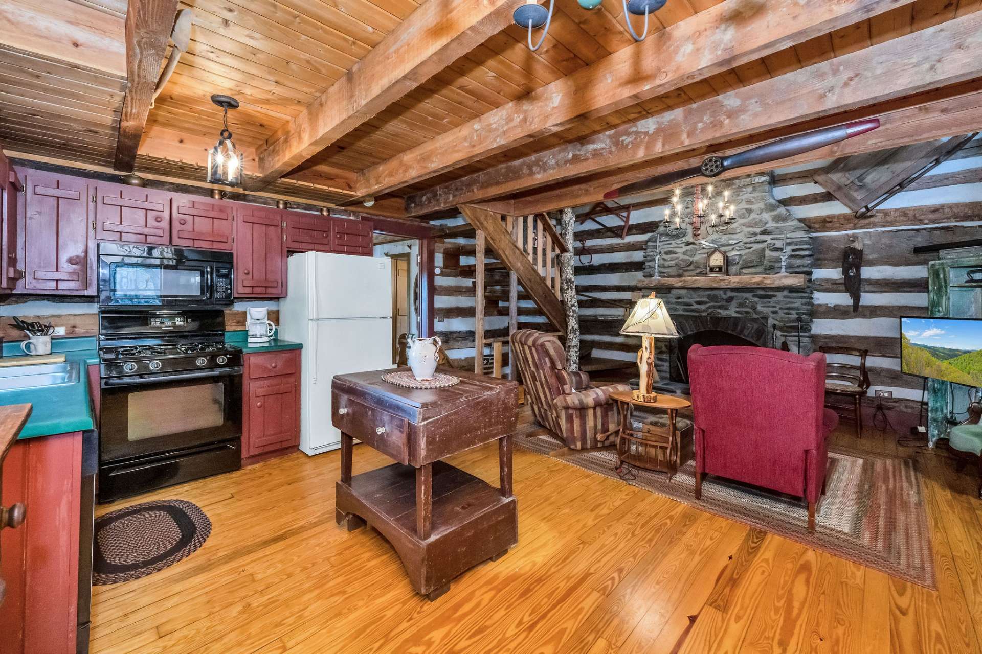 The great room merges kitchen, dining, and living spaces into one cohesive sanctuary for connection, celebration, and reflection amidst the beauty of the surroundings.