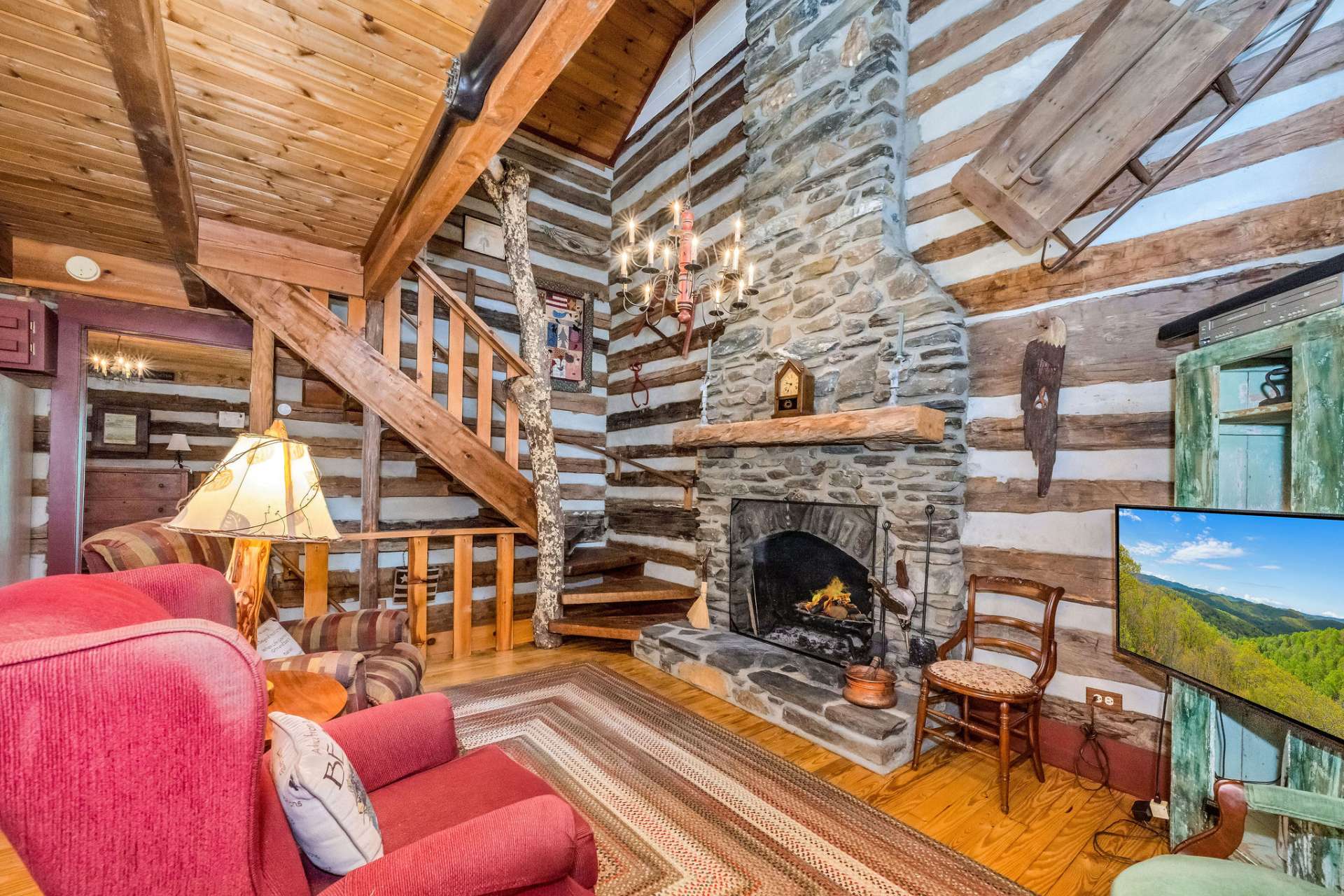 This wood-burning fireplace adds a cozy ambience that only open flames bring to capture the essence of mountain living.